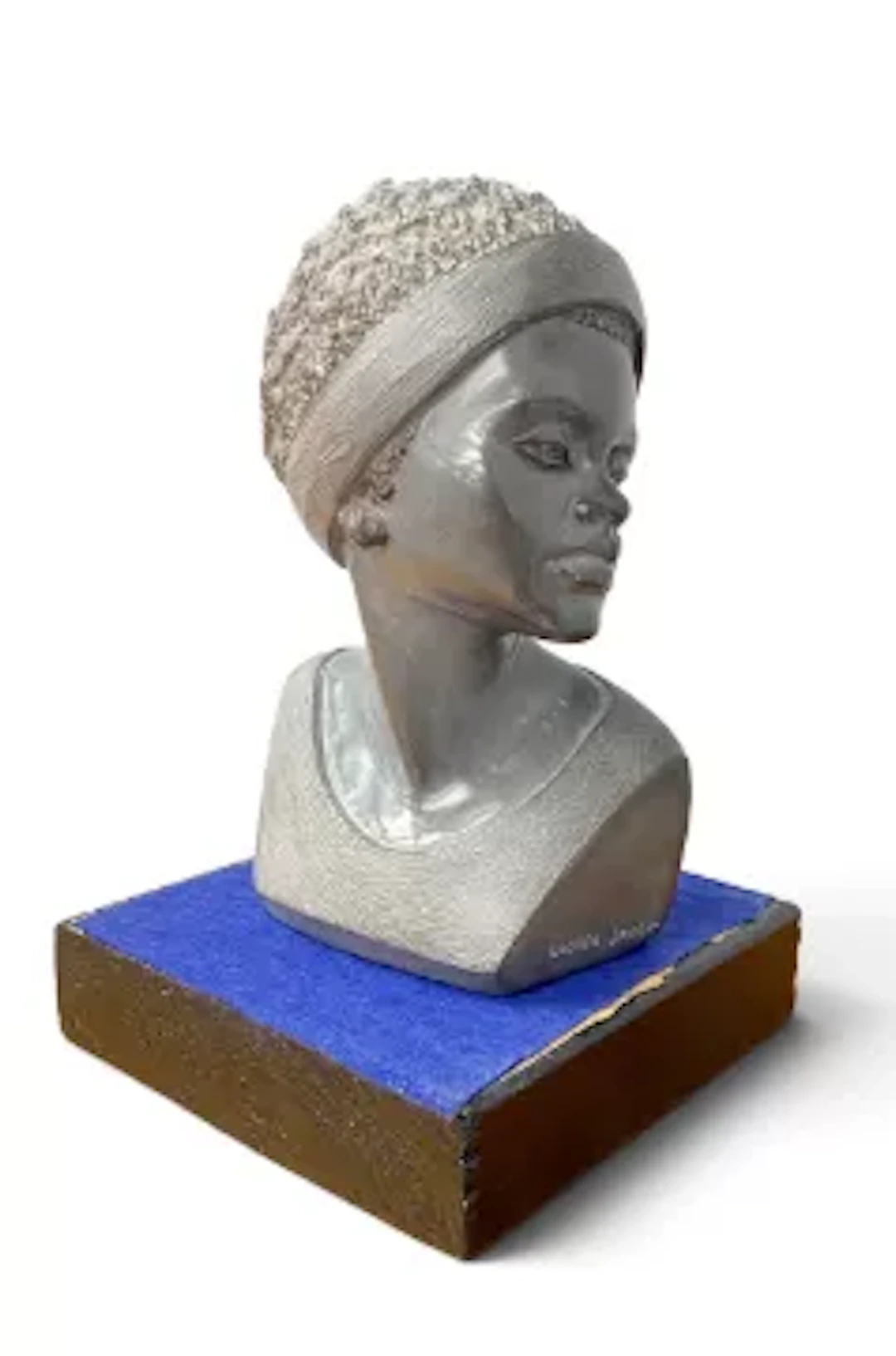Casper Darare (1952-2001), a polished stone bust of a woman in headdress