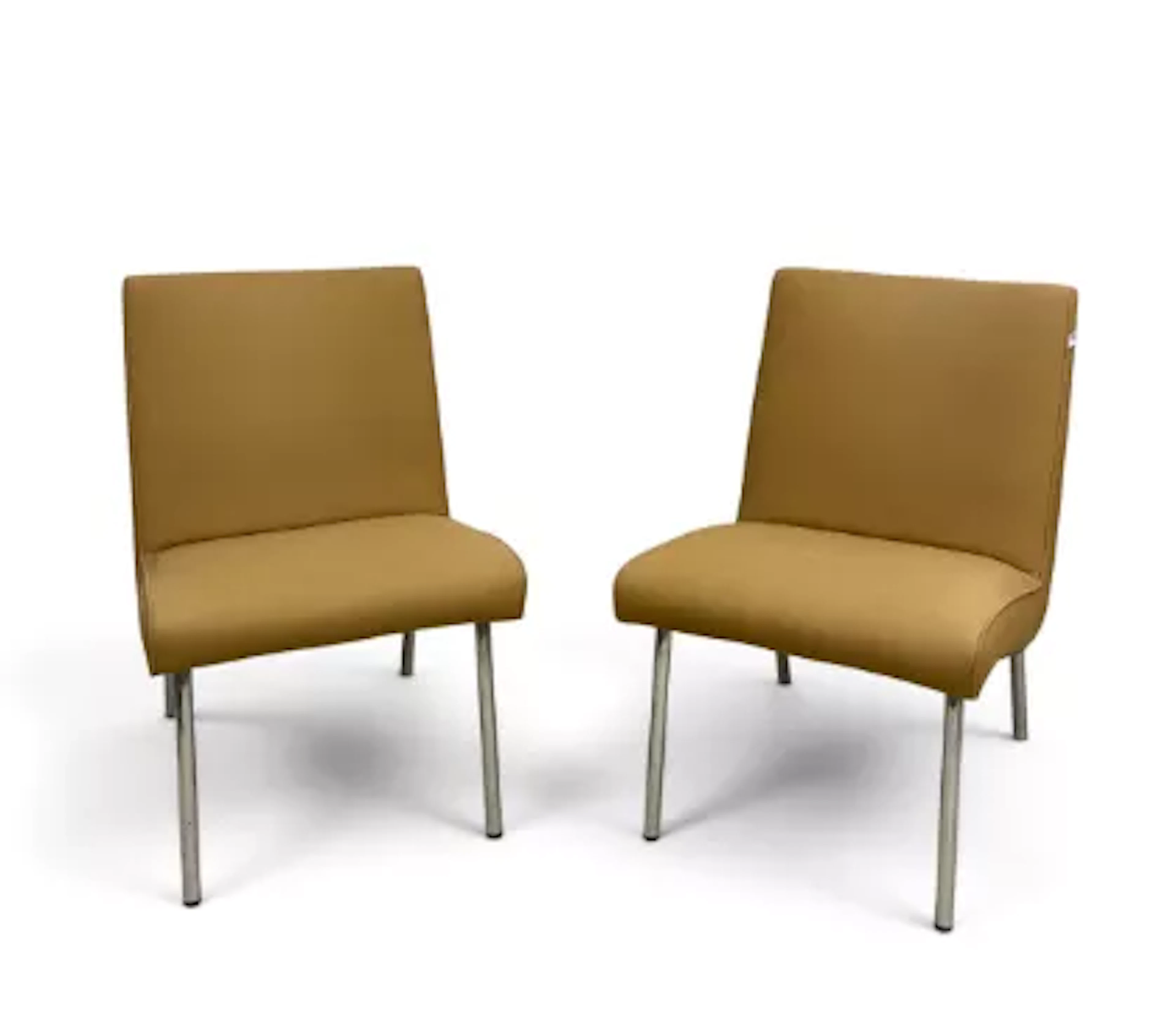 A pair of 1960's vintage Vostra 607 chairs by Walter Knoll, with labels.