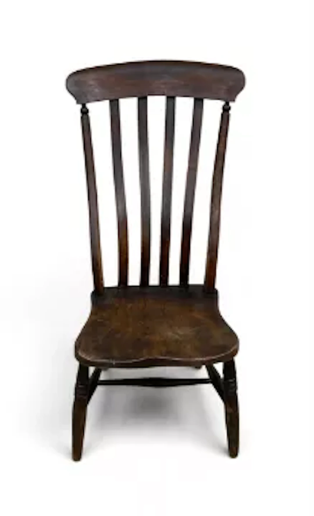 A 19th century high back Windsor chair with elm seat on turned stretchered