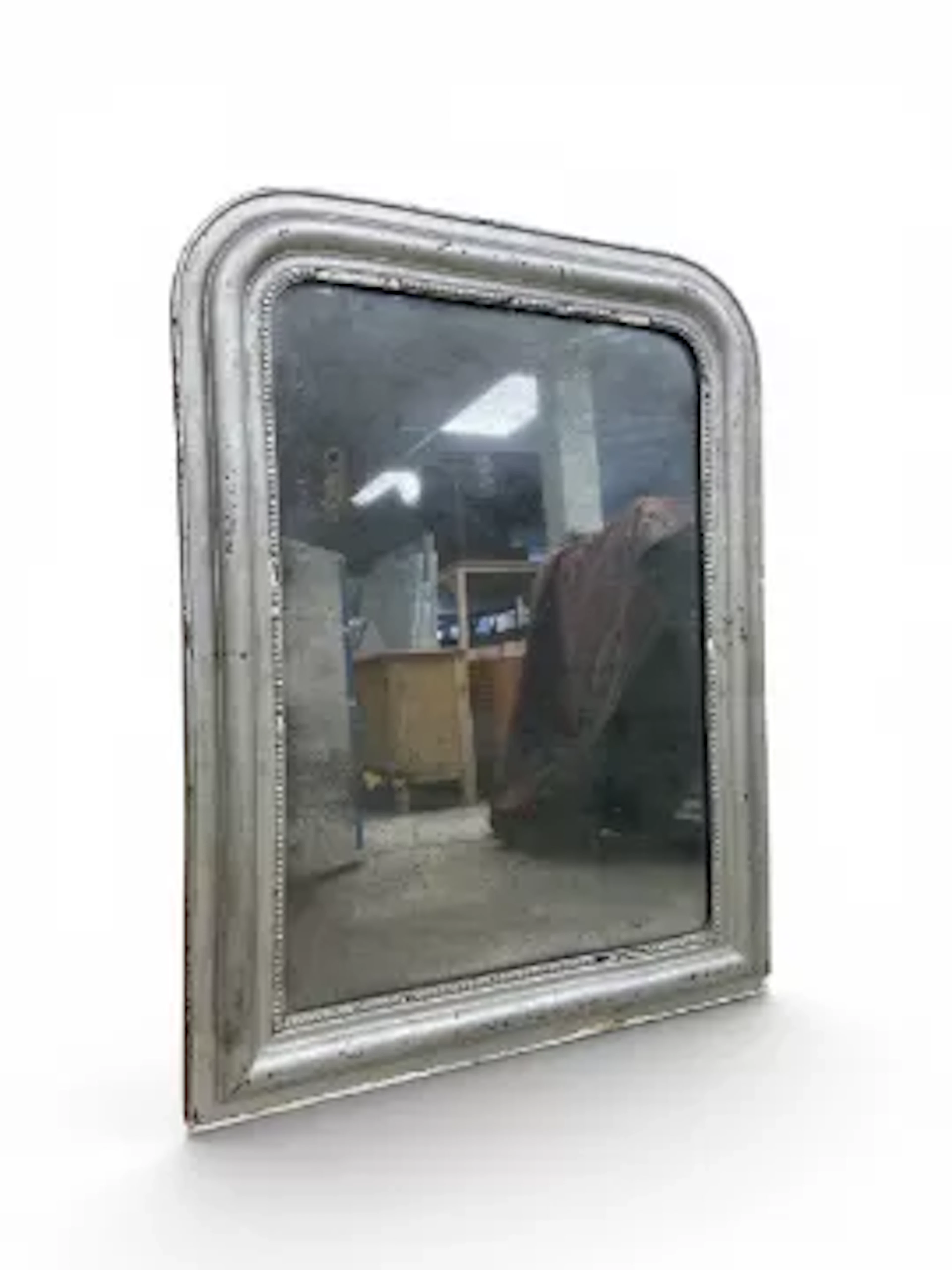 A 19th century silver painted French Louis Phillipe style wall mirror
