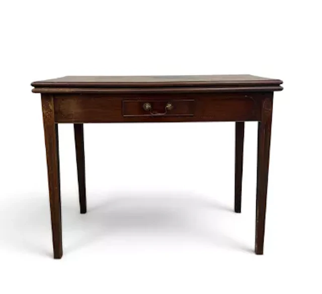 A 19th century mahogany side table having a figured fold-out top over