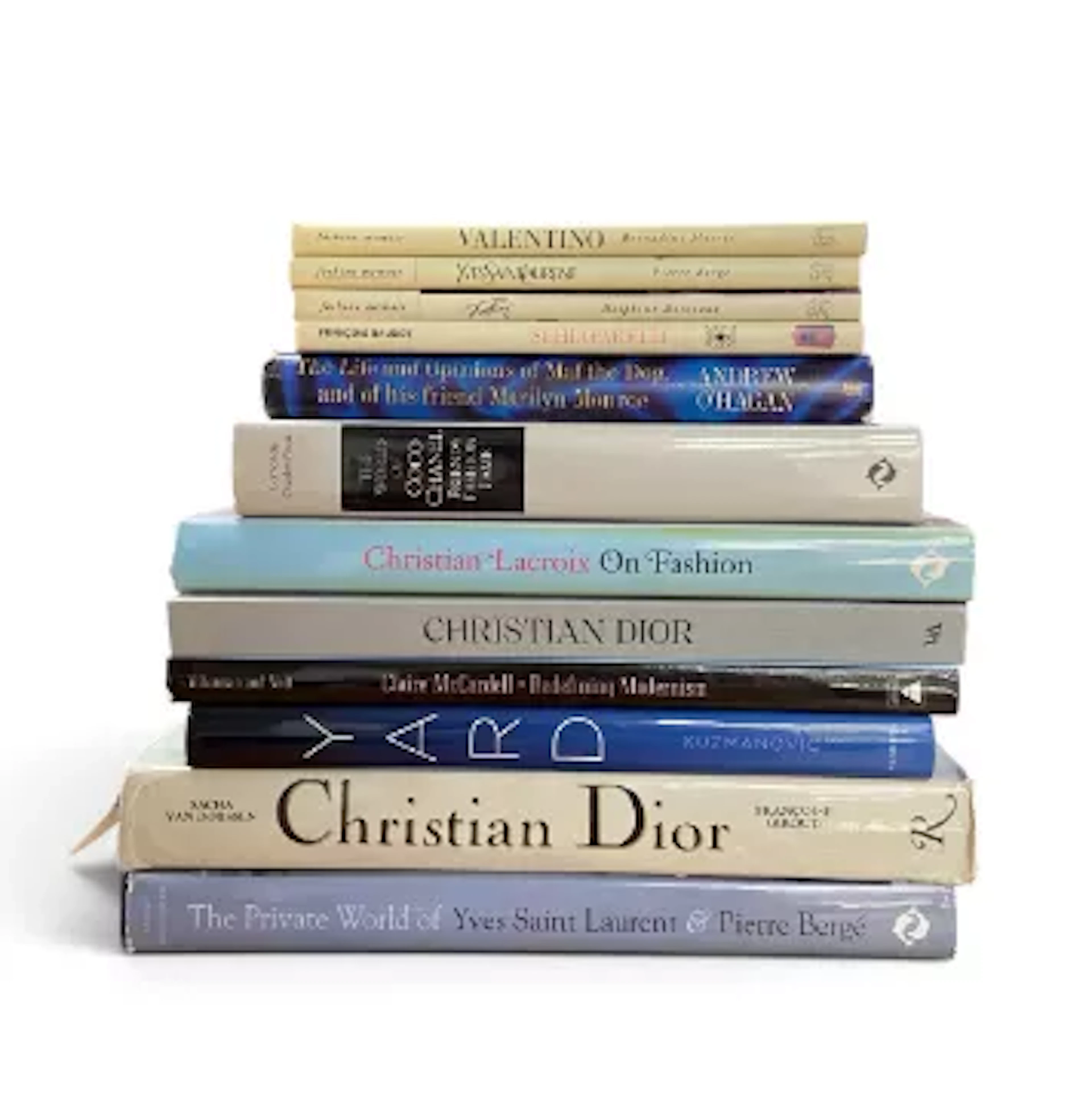 A mixed collection of hardback fashion books: Dior, Lacroix, Valentino