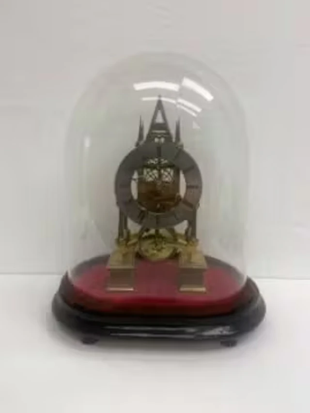A 19th century brass skeleton clock, the steel dial marked Barling