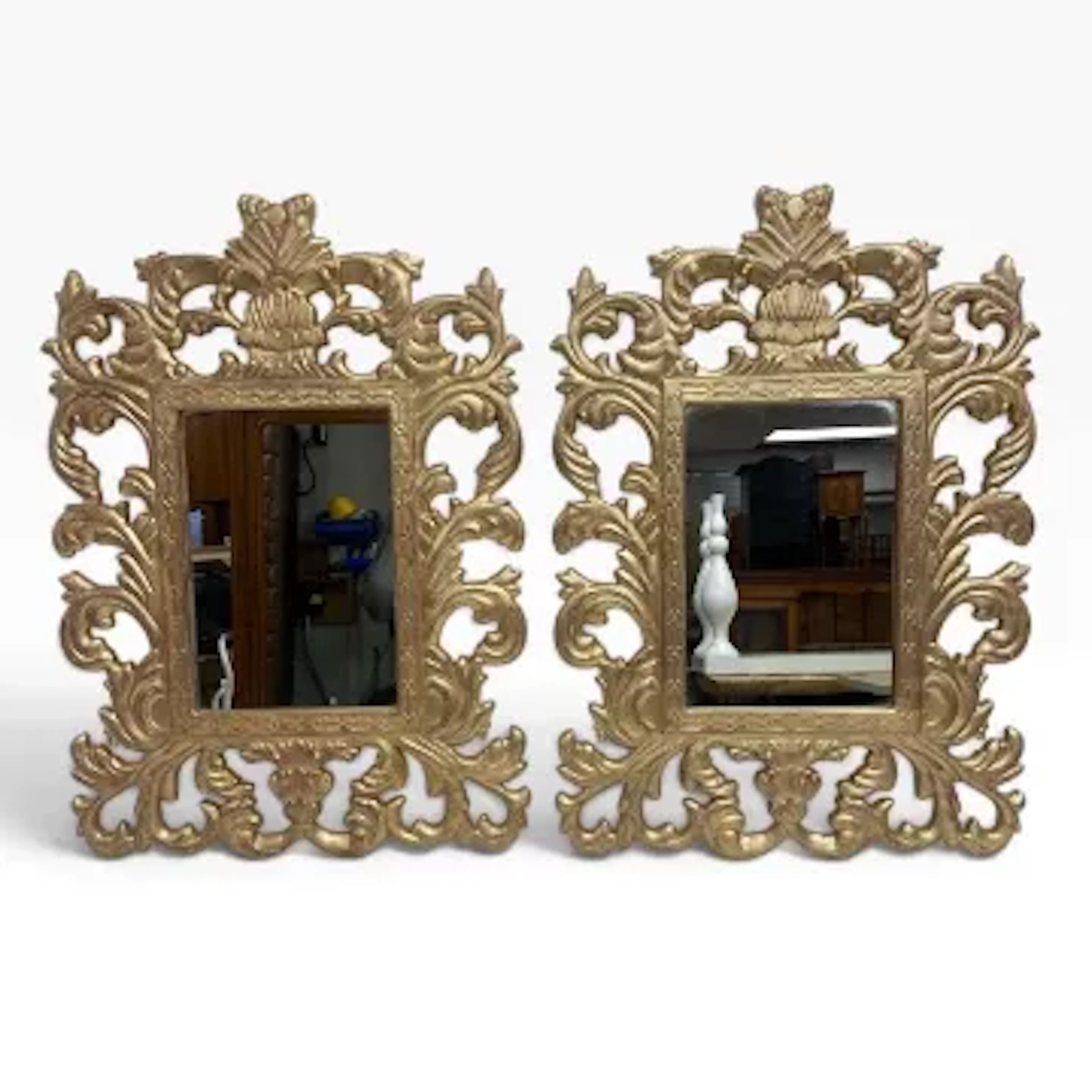 A pair of contemporary wall mirrors in the 19th century Florentine