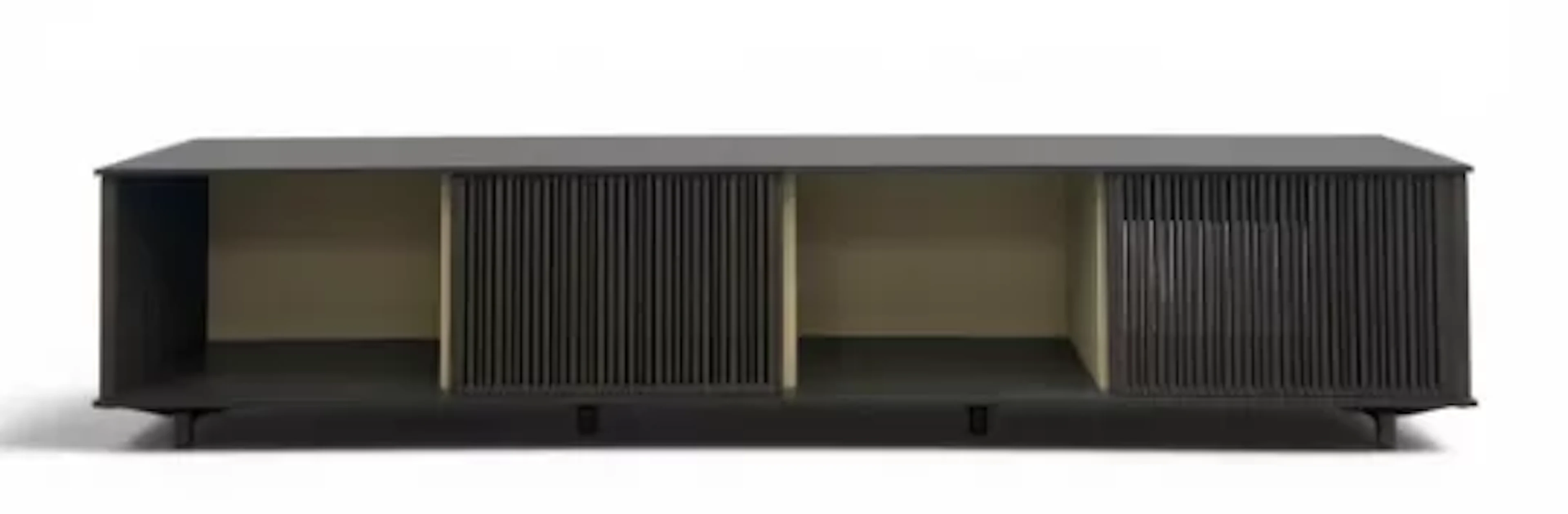 A contemporary Lloyd low media cabinet with sliding slatted doors