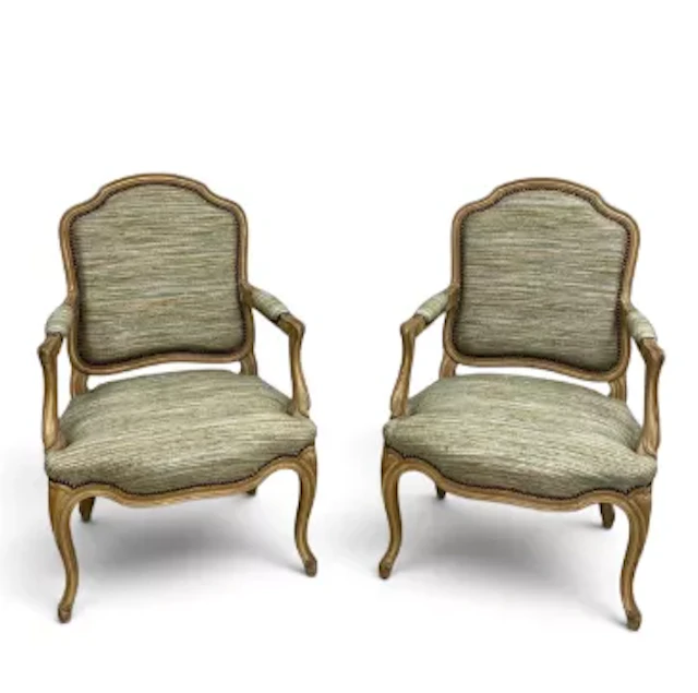 A pair of Louis XV style painted frame open armchairs in studded striped