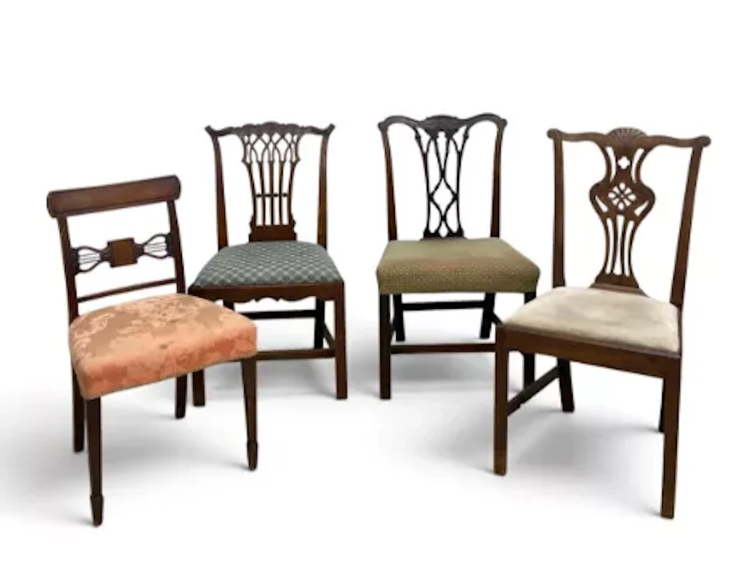 A miscellaneous collection of four 19th century mahogany dining chairs.