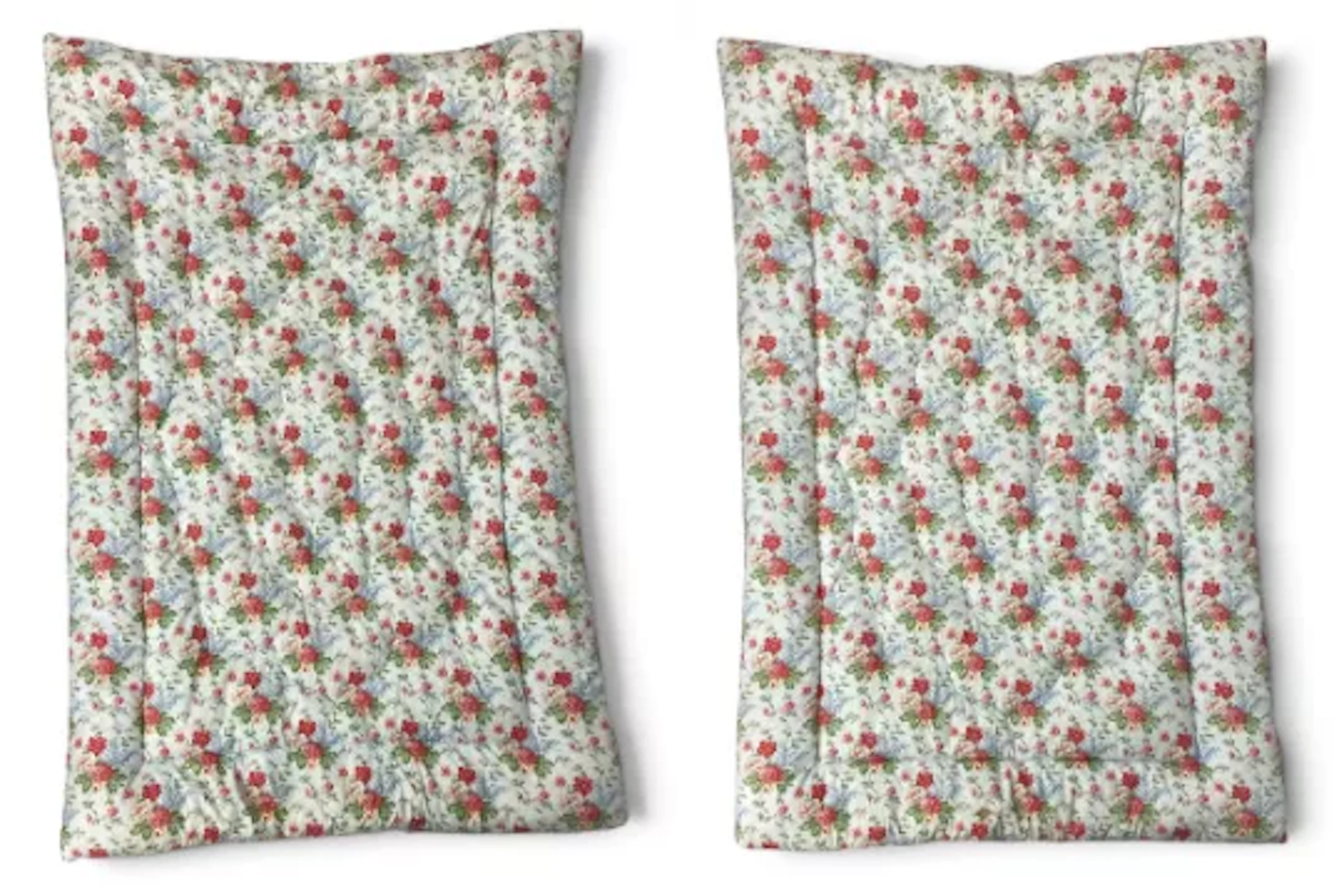 A pair of vintage quilted eider down filled bed quilts or covers with