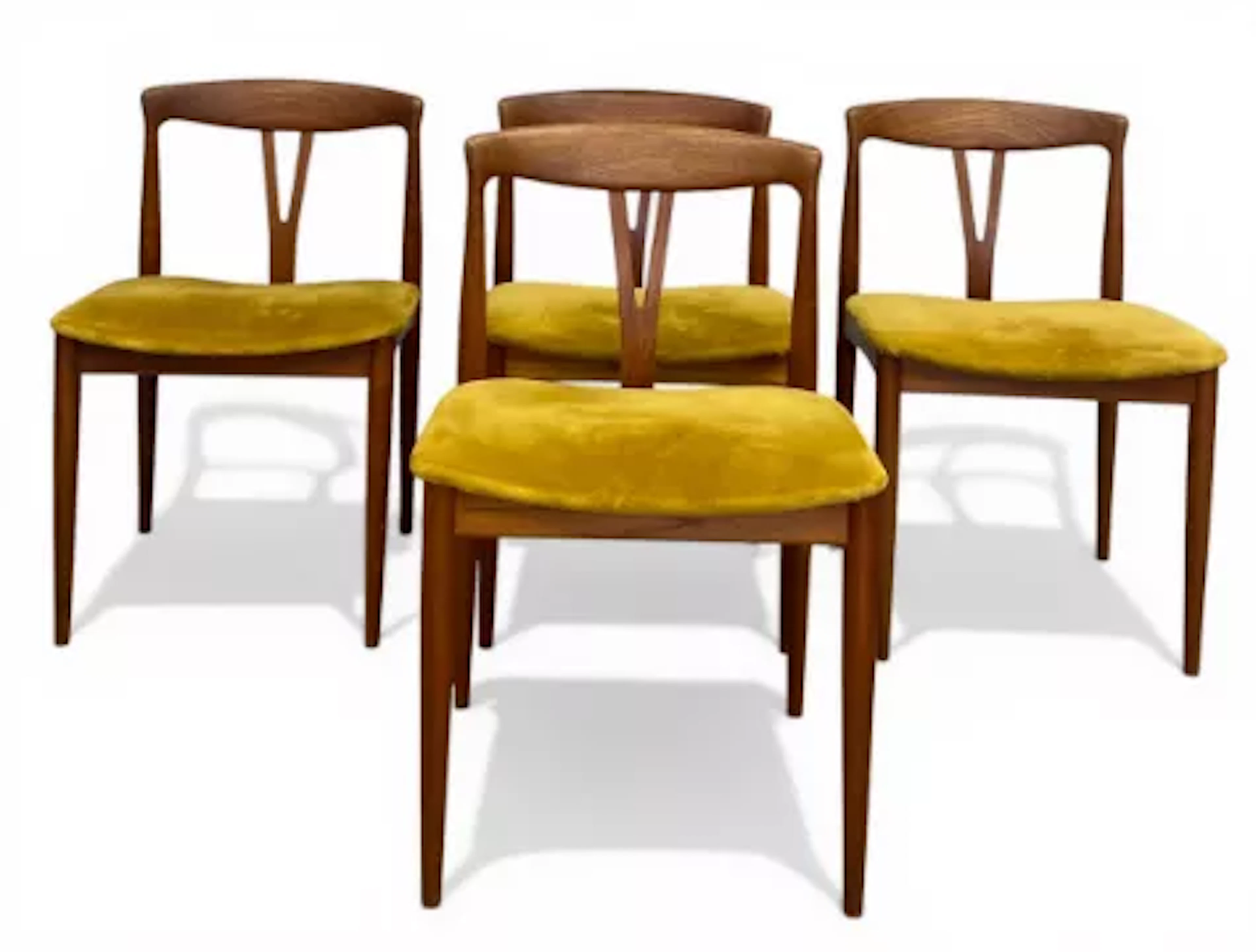 A set of four mid-century Danish teak 'Juliane' dining chairs each