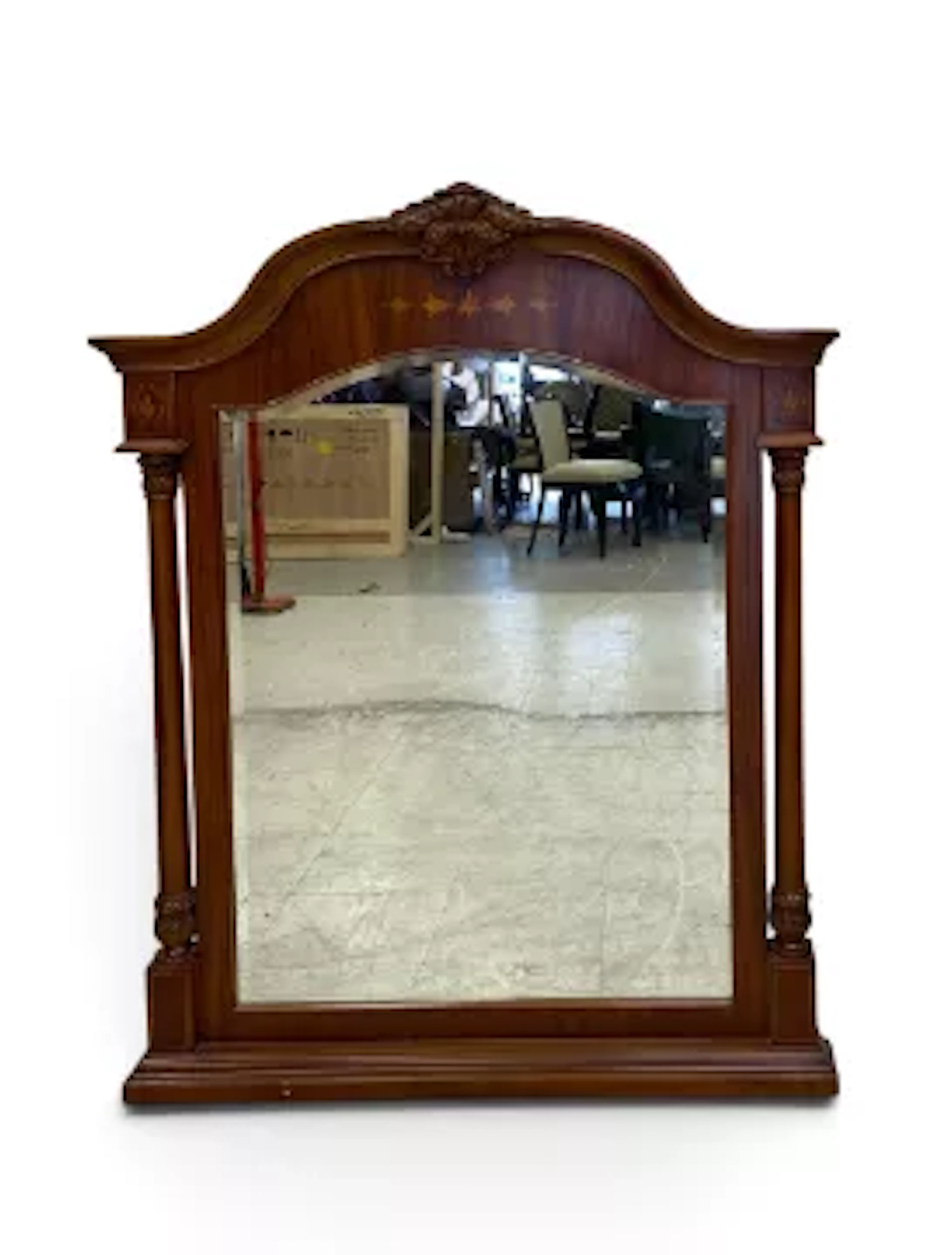A Continental style walnut and inlaid wall or overmantel mirror with