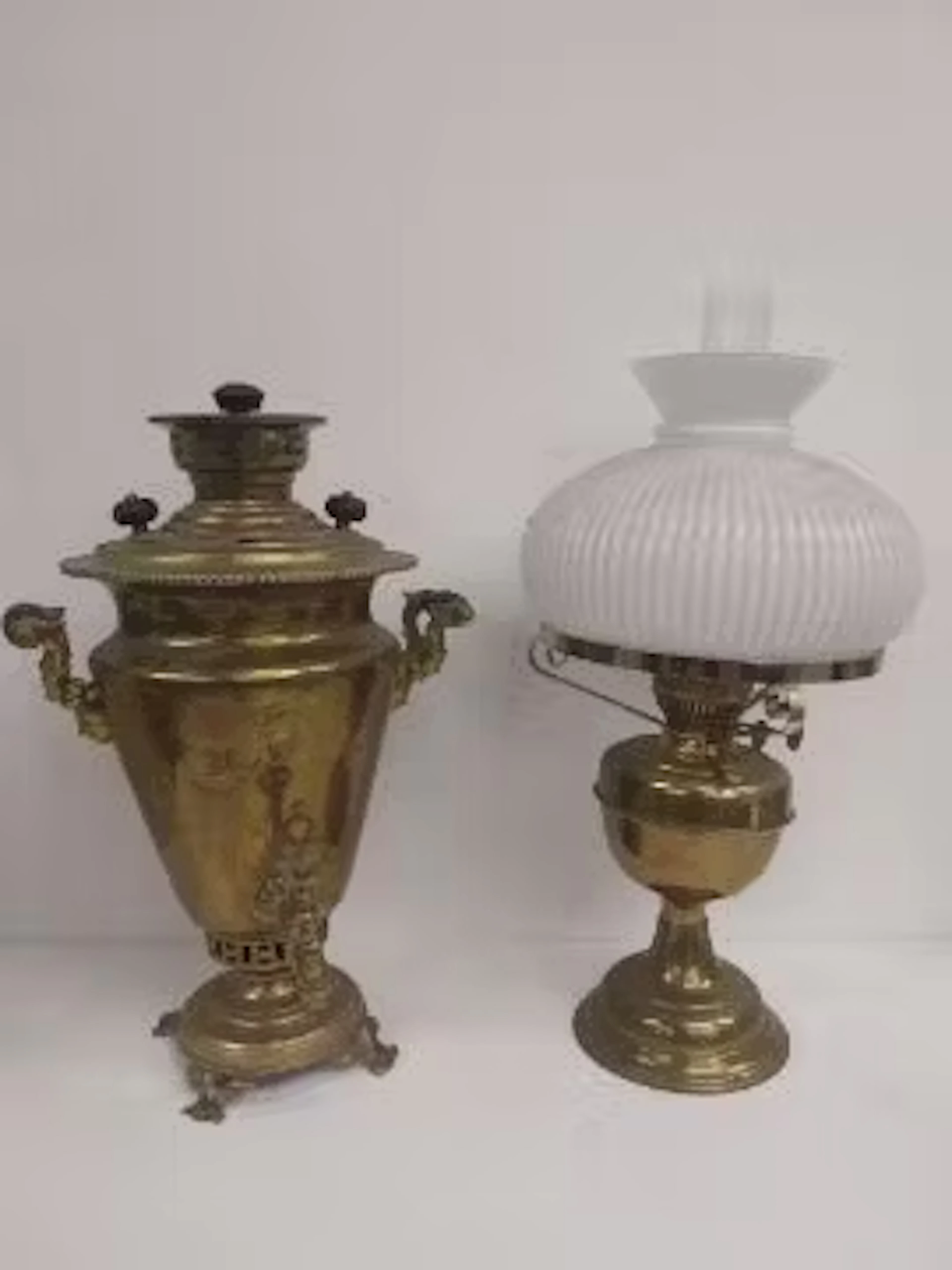 A 19th century brass tea urn with cyrillic inscription and a 19th