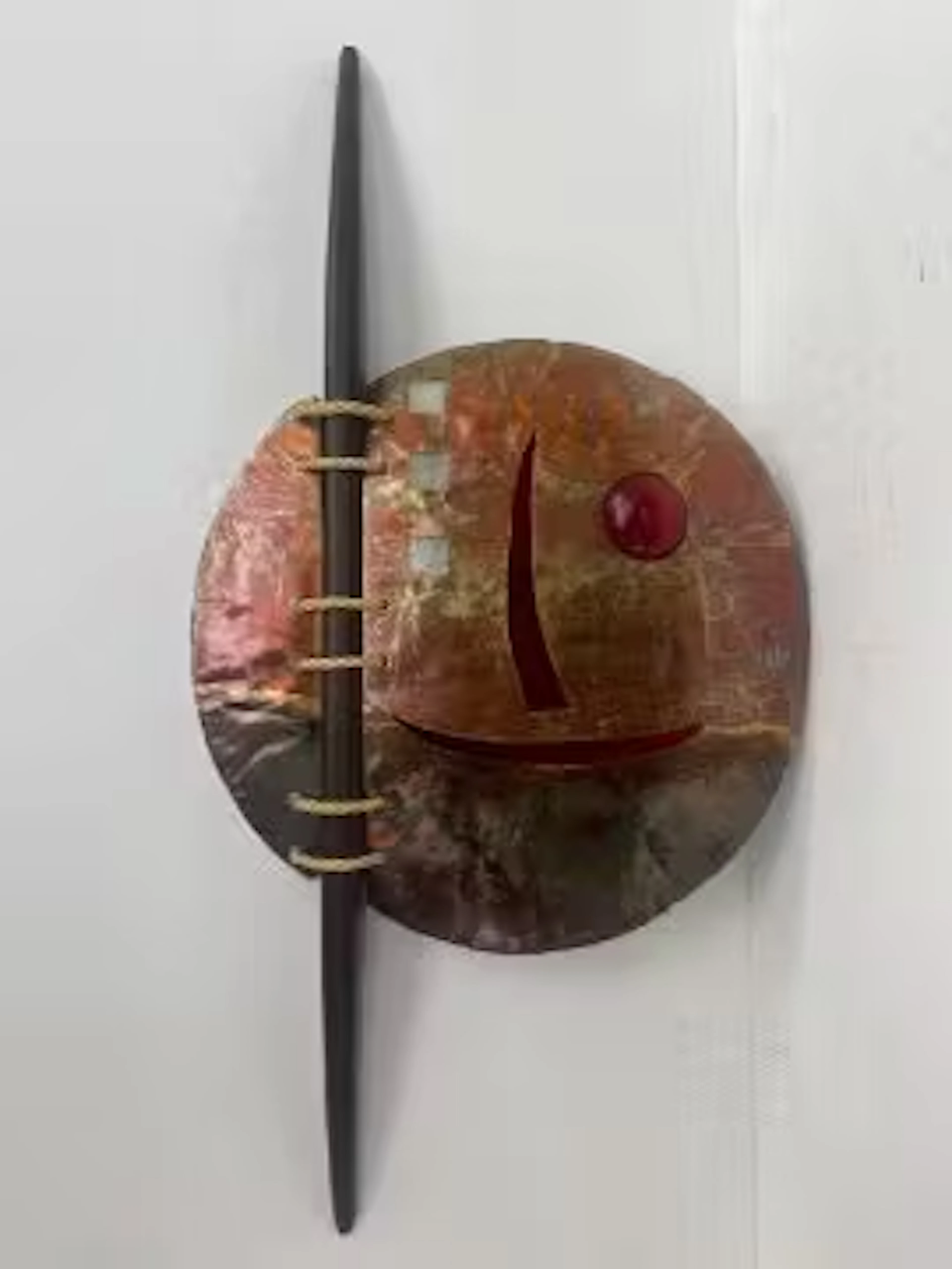 A 1980's Italian sculptural wall art style lamp in pierced and etched
