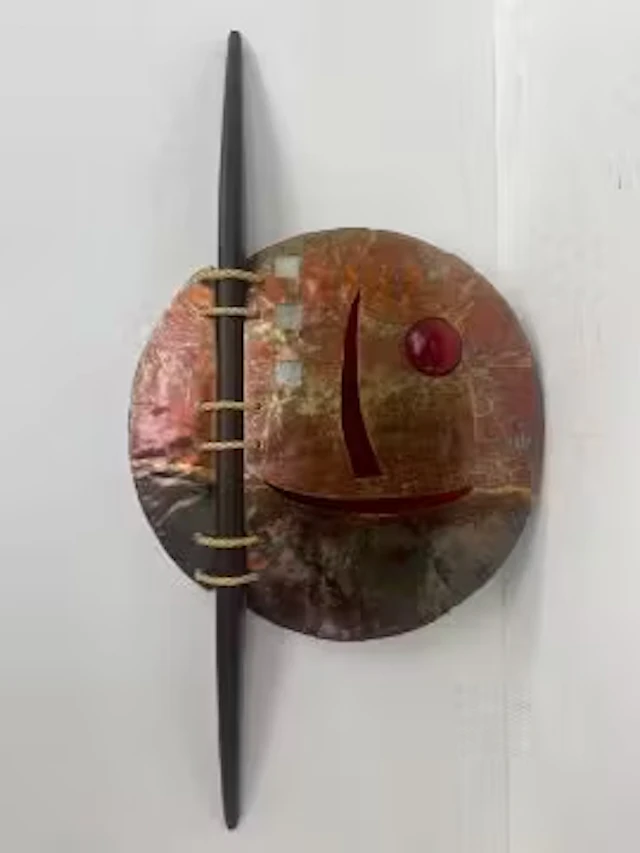 A 1980's Italian sculptural wall art style lamp in pierced and etched