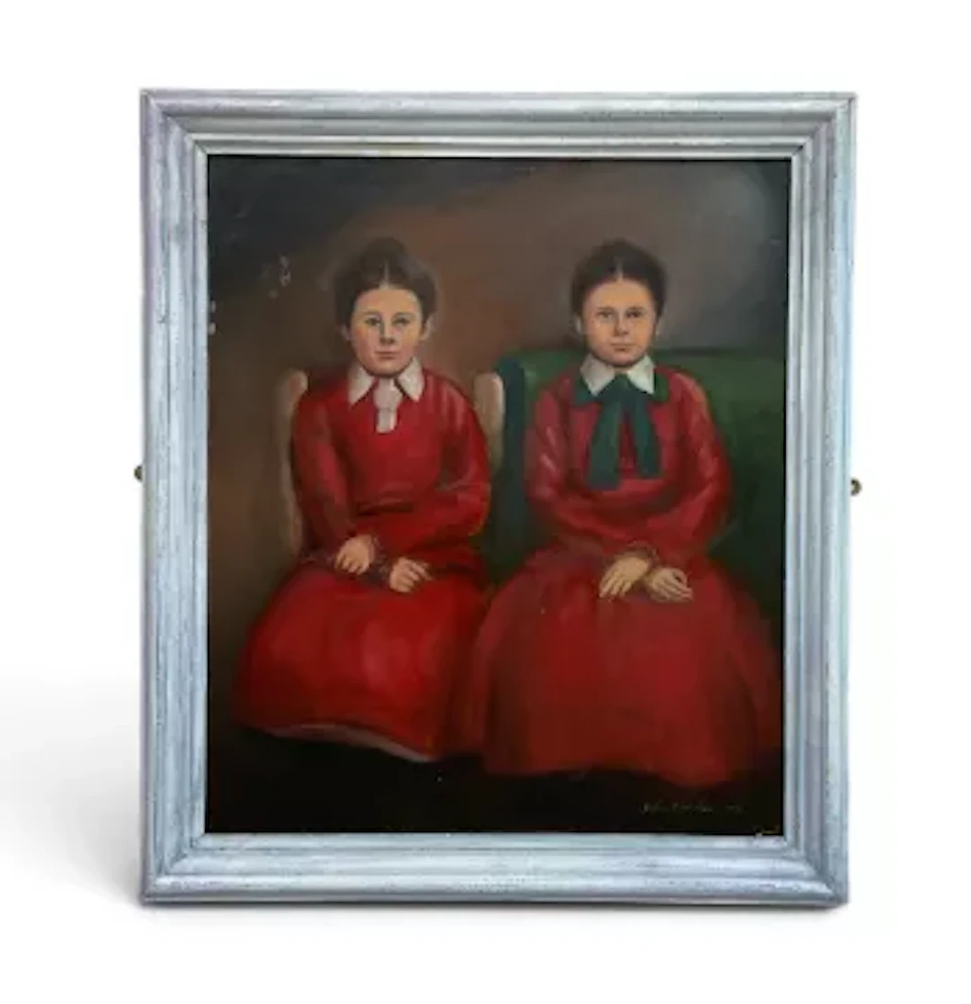 A framed oil on board, portrait of two girls, signed and dated John