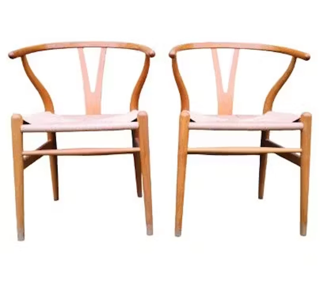 A pair of Hans Wegner for Carl Hansen model CH24 Wishbone chairs with
