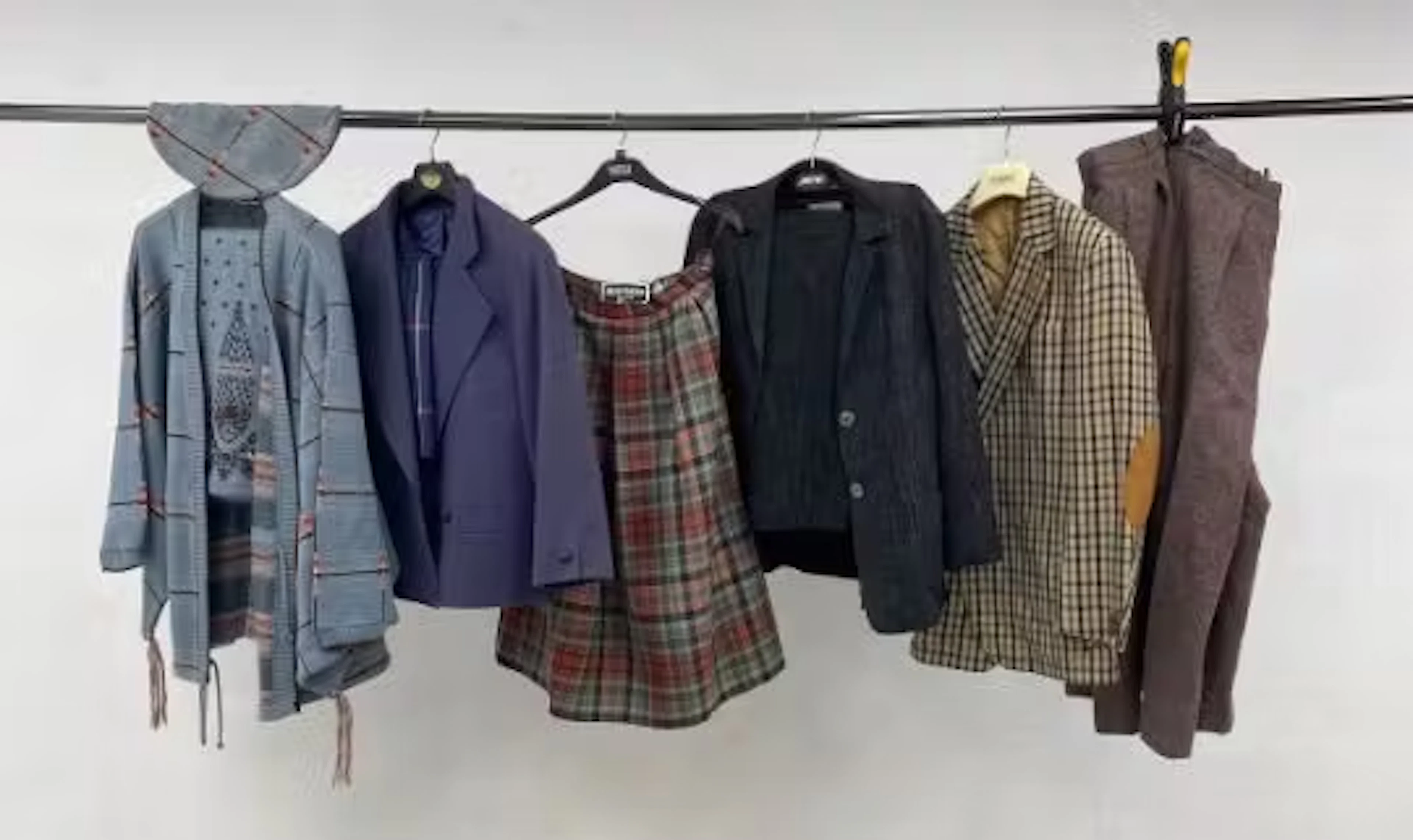 A mixed collection of ladies' designer clothes to include a vintage