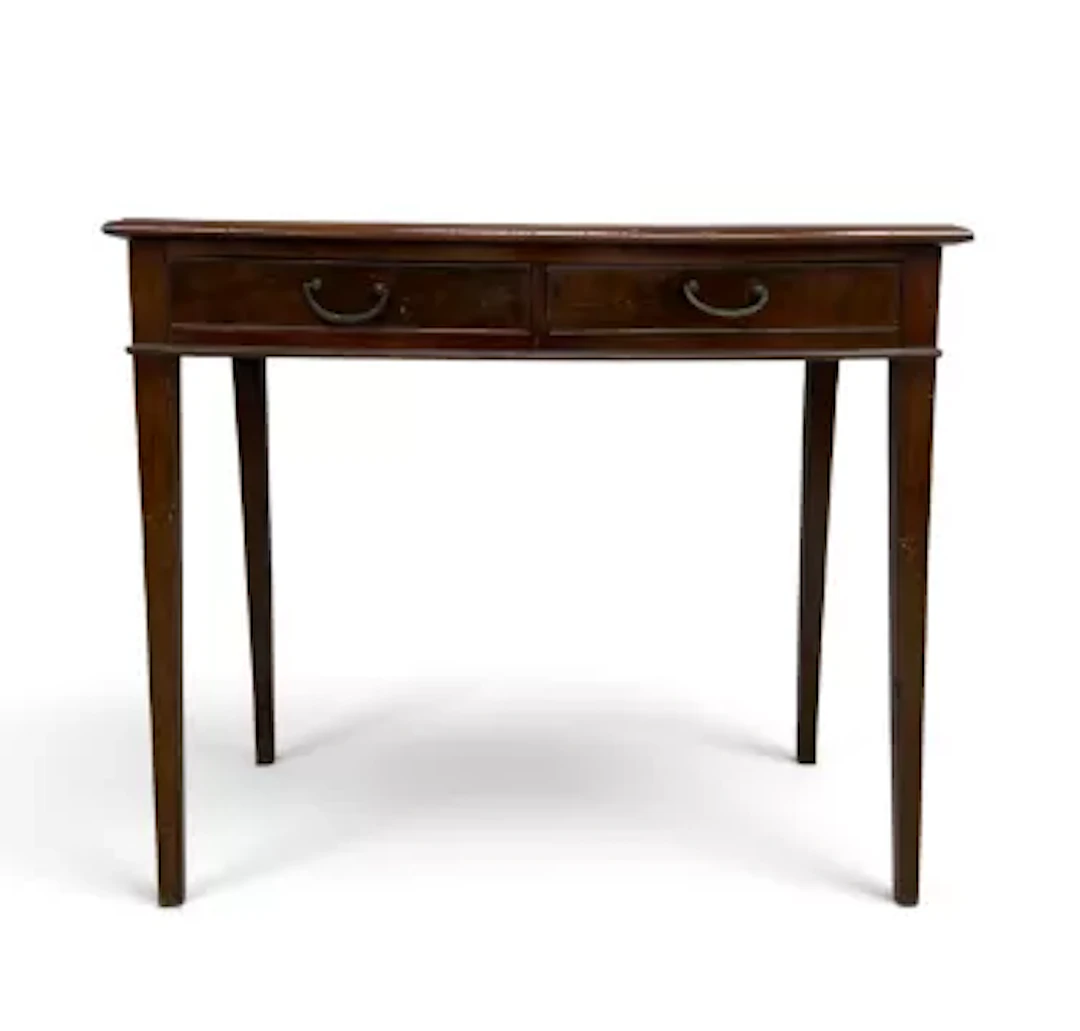 A 19th century mahogany side table having a rectangular thumb-moulded