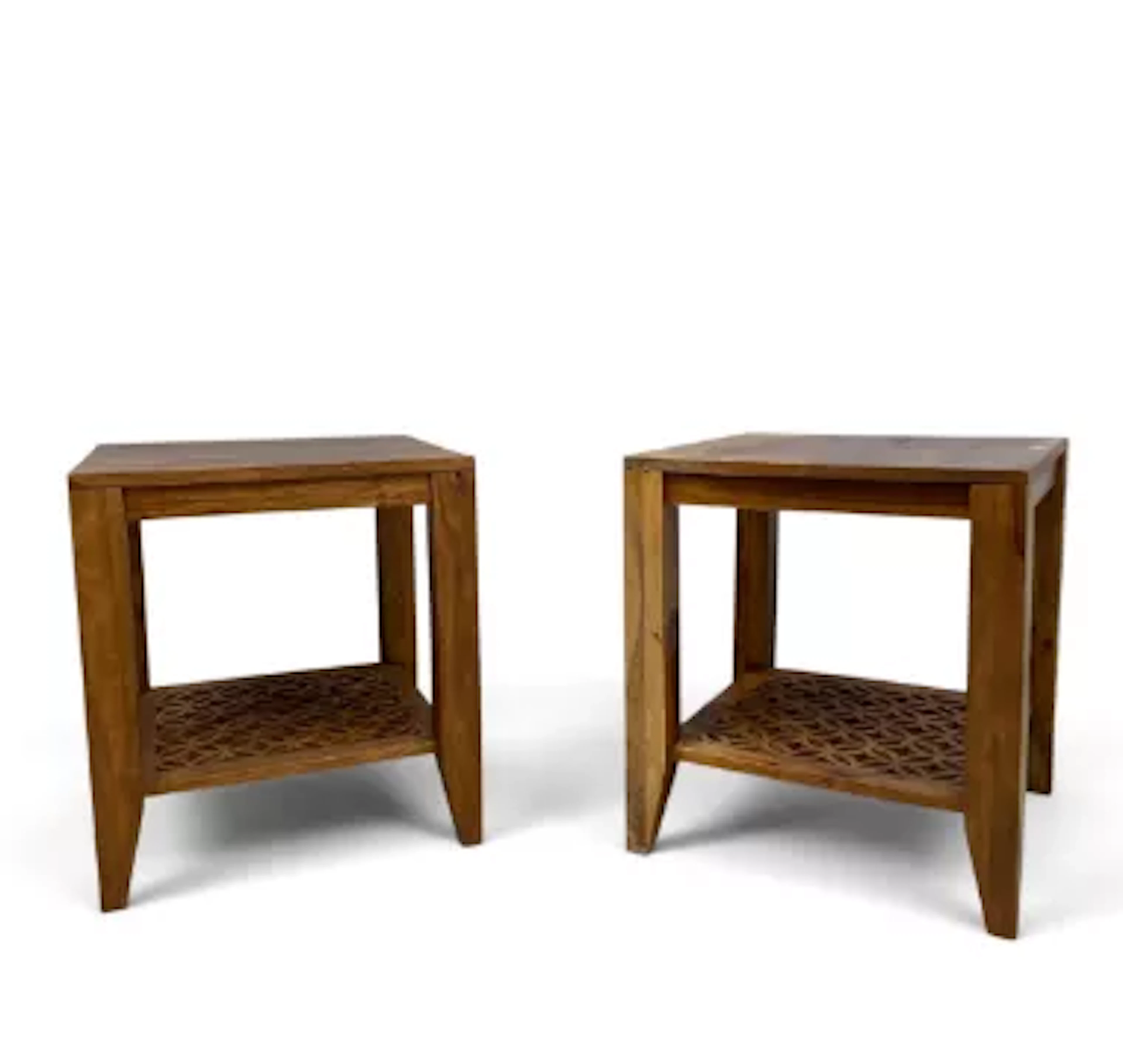 A pair of contemporary Eastern hardwood bedside or lamp tables. H.50cm