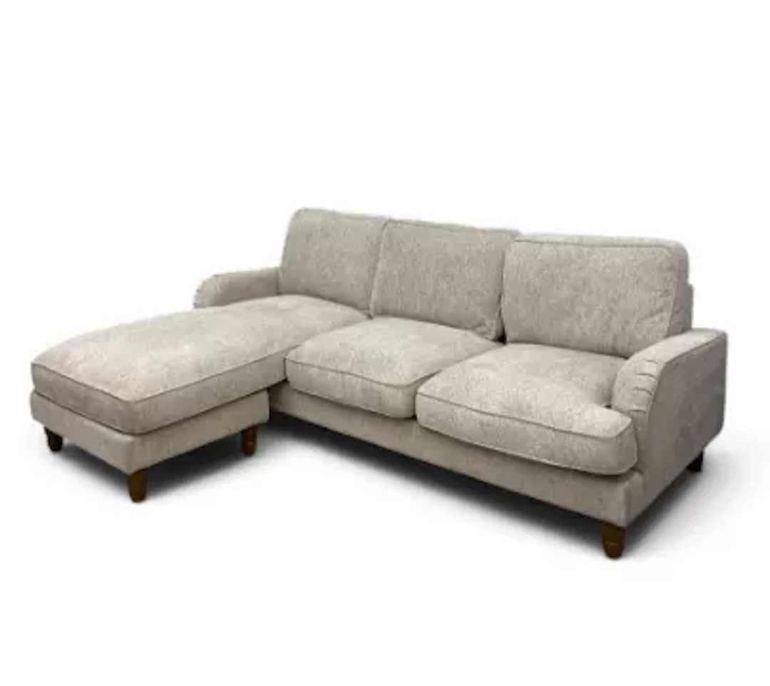 A contemporary three seater L-shaped sofa in chenille upholstery and