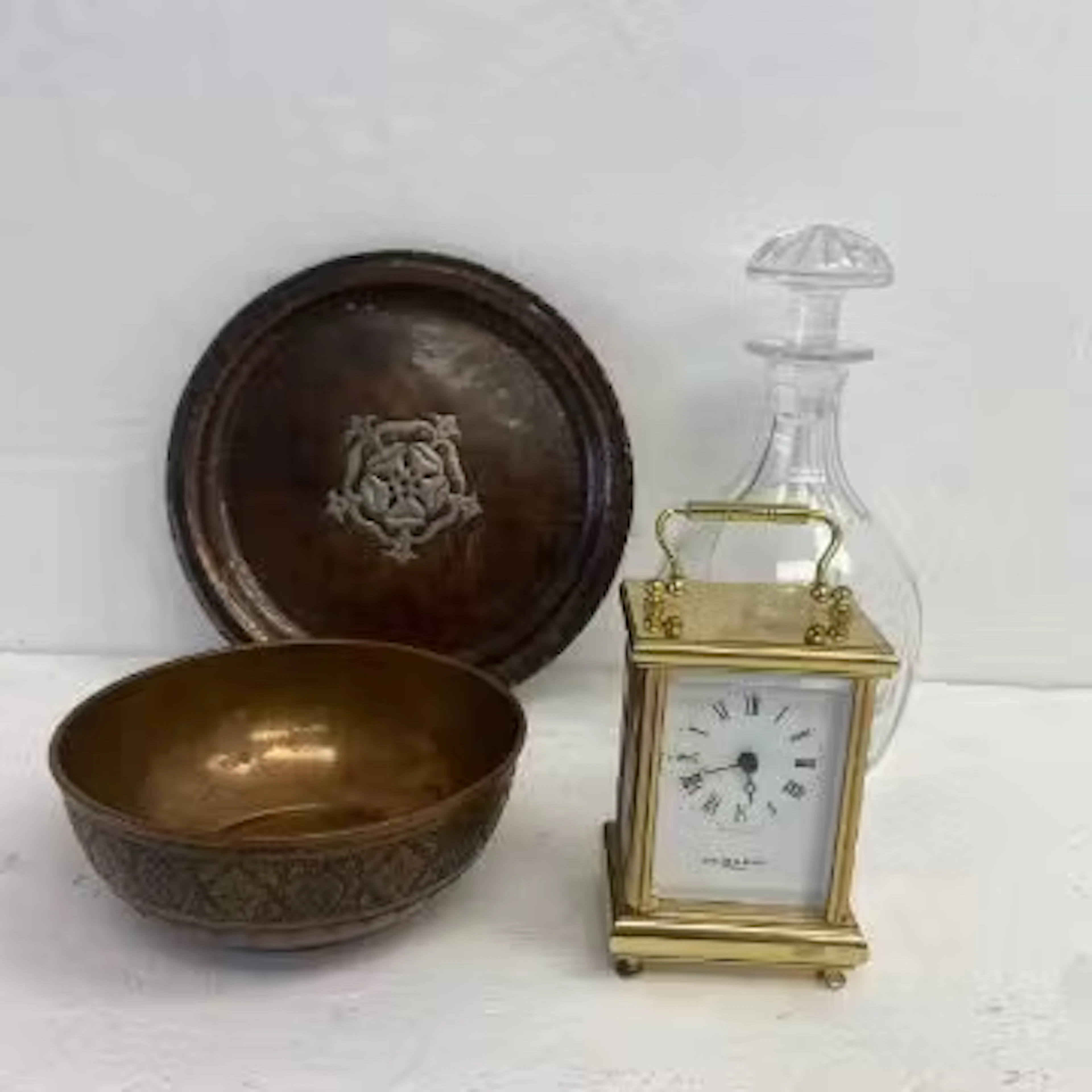 An Arts and Crafts copper tray with inset white metal rose motif