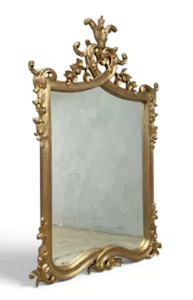 A contemporary 19th century style wall mirror in foliate gilt frame.