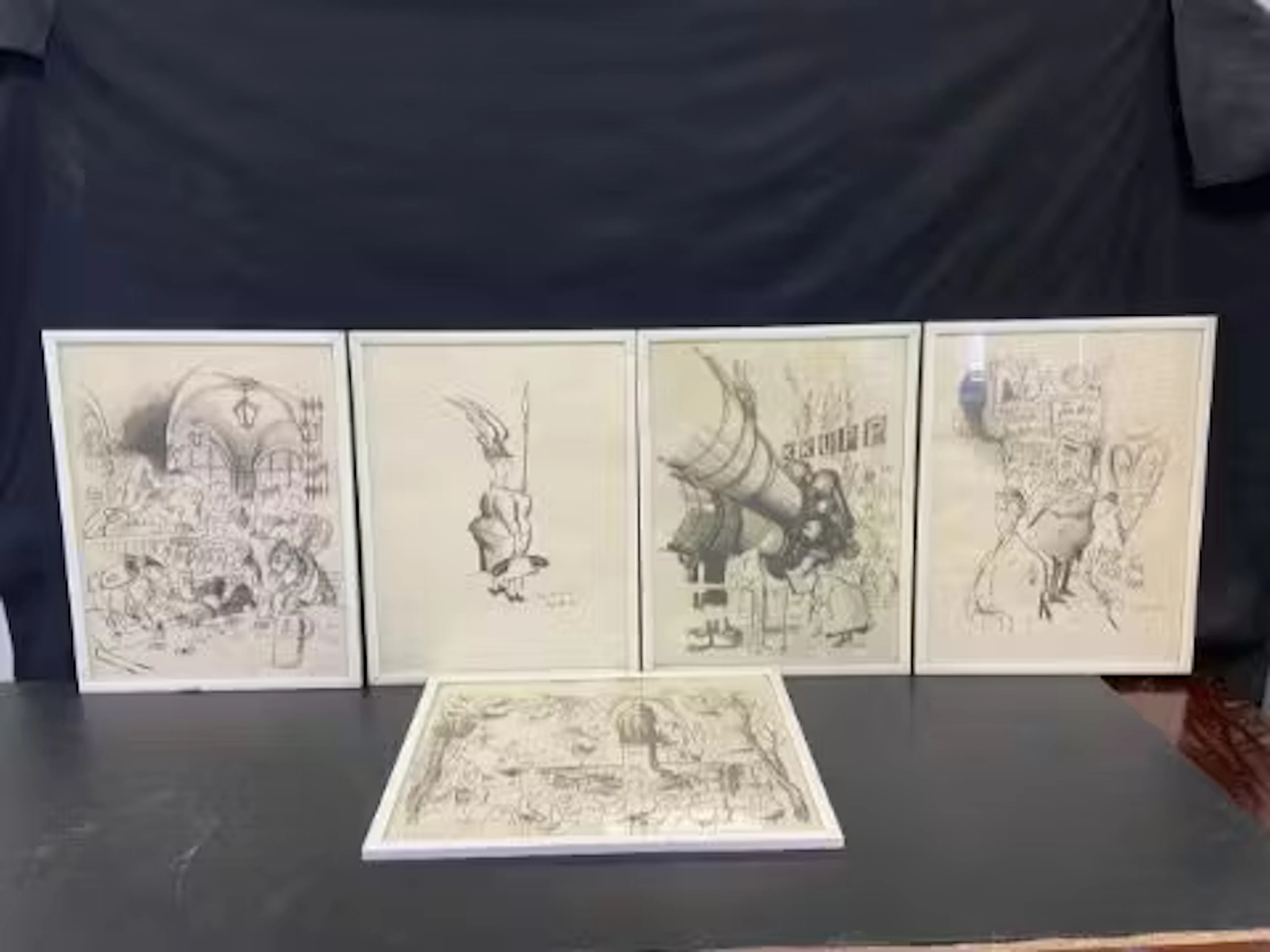A set of five vintage framed and glazed prints; Ronald Searle cartoons.