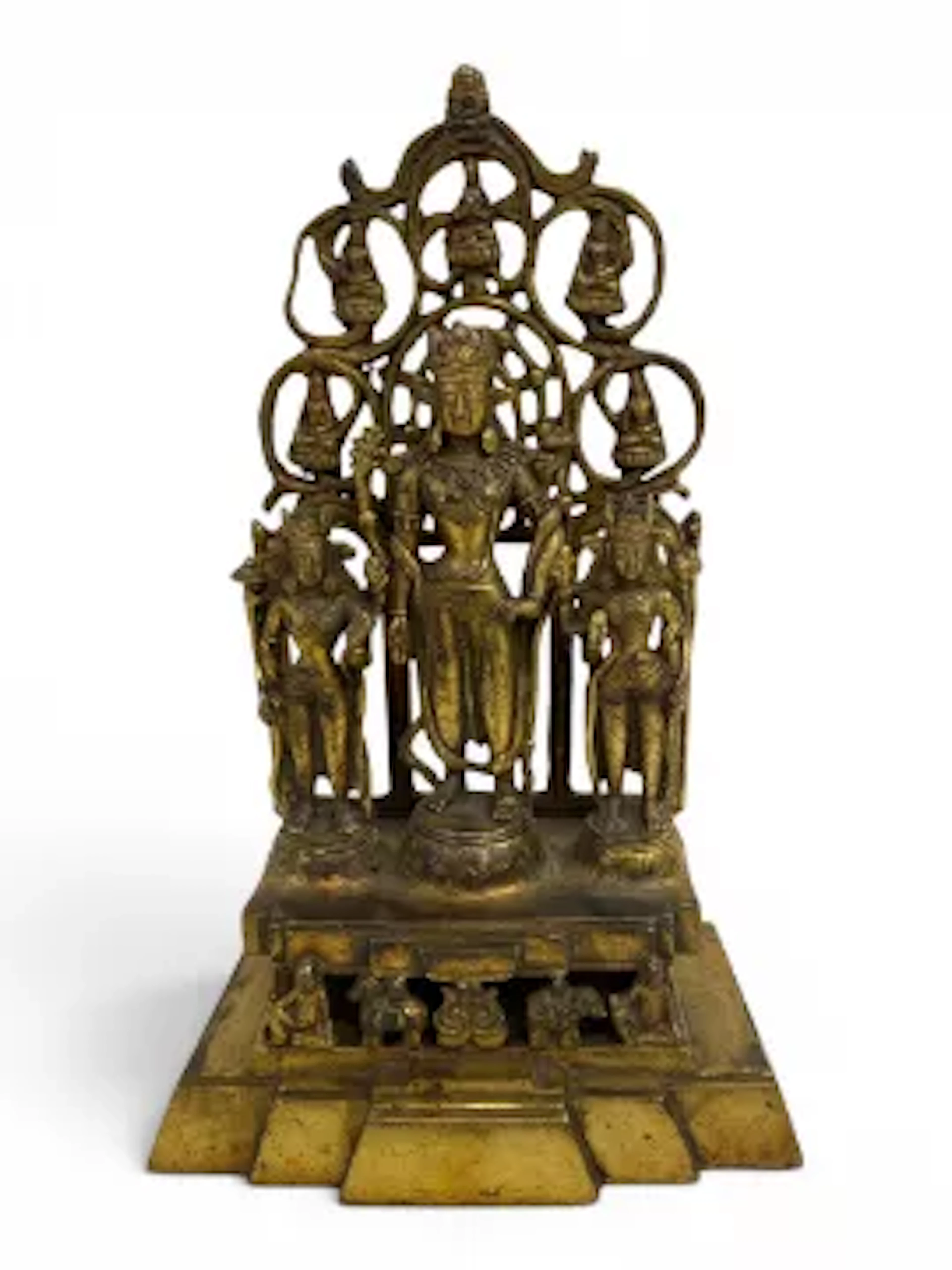 A vintage Tibetan style brass temple figure group depicting the Buddhist