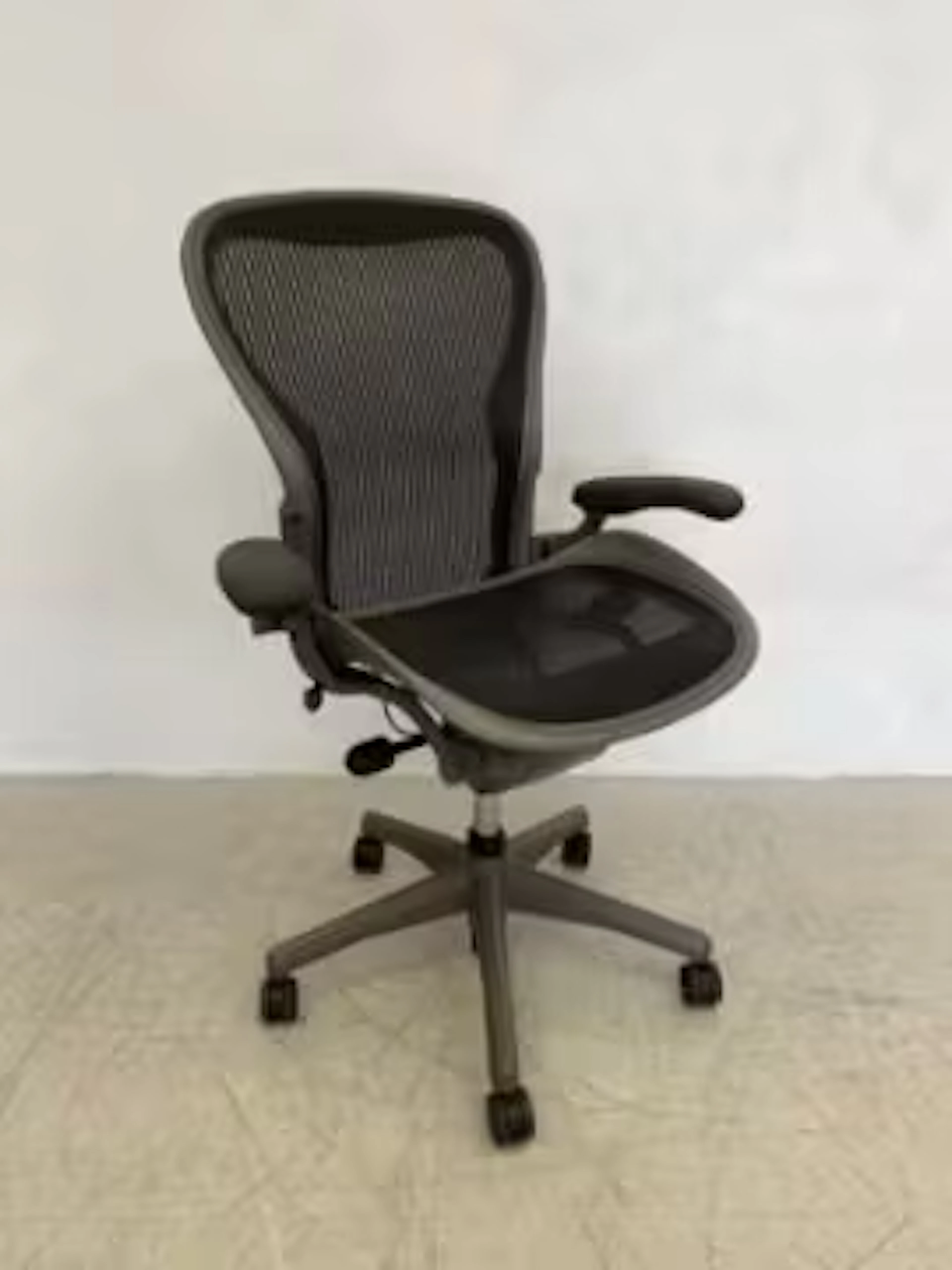 A contemporary ergonomic office or desk chair in the style of Herman