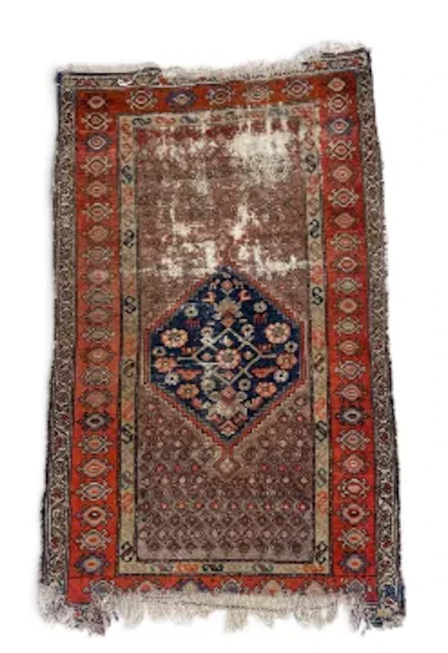 A Qashqai rug with central lozenge medallion on a stylised foliate