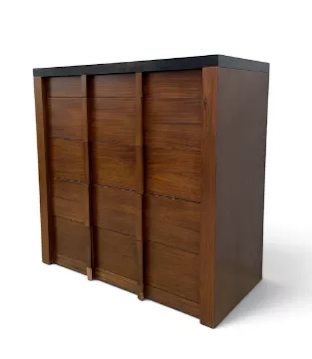 A contemporary teak chest of drawers, mid-century geometric design