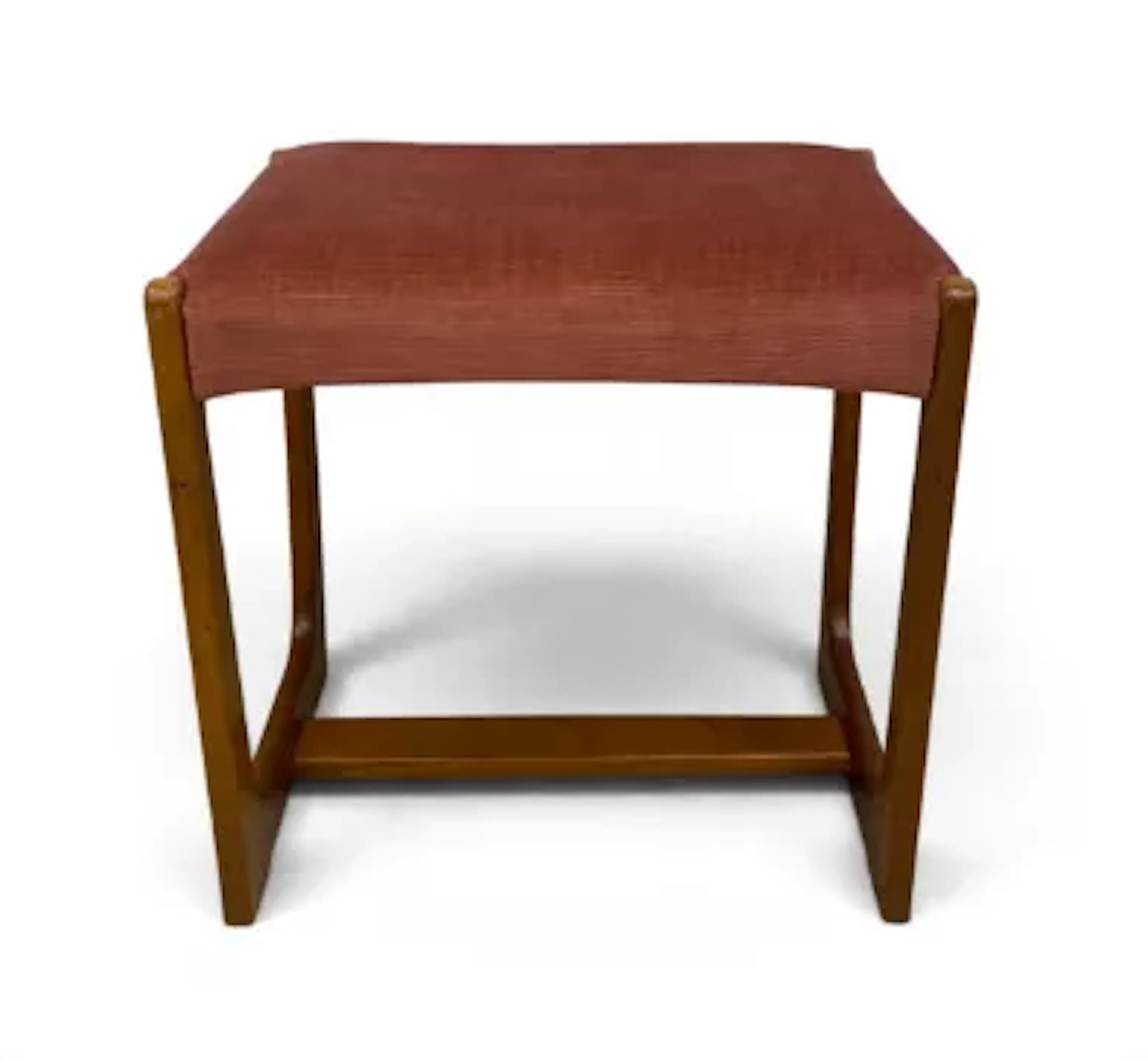 A mid century teak footstool. H.46 x W.46 x D.36cm