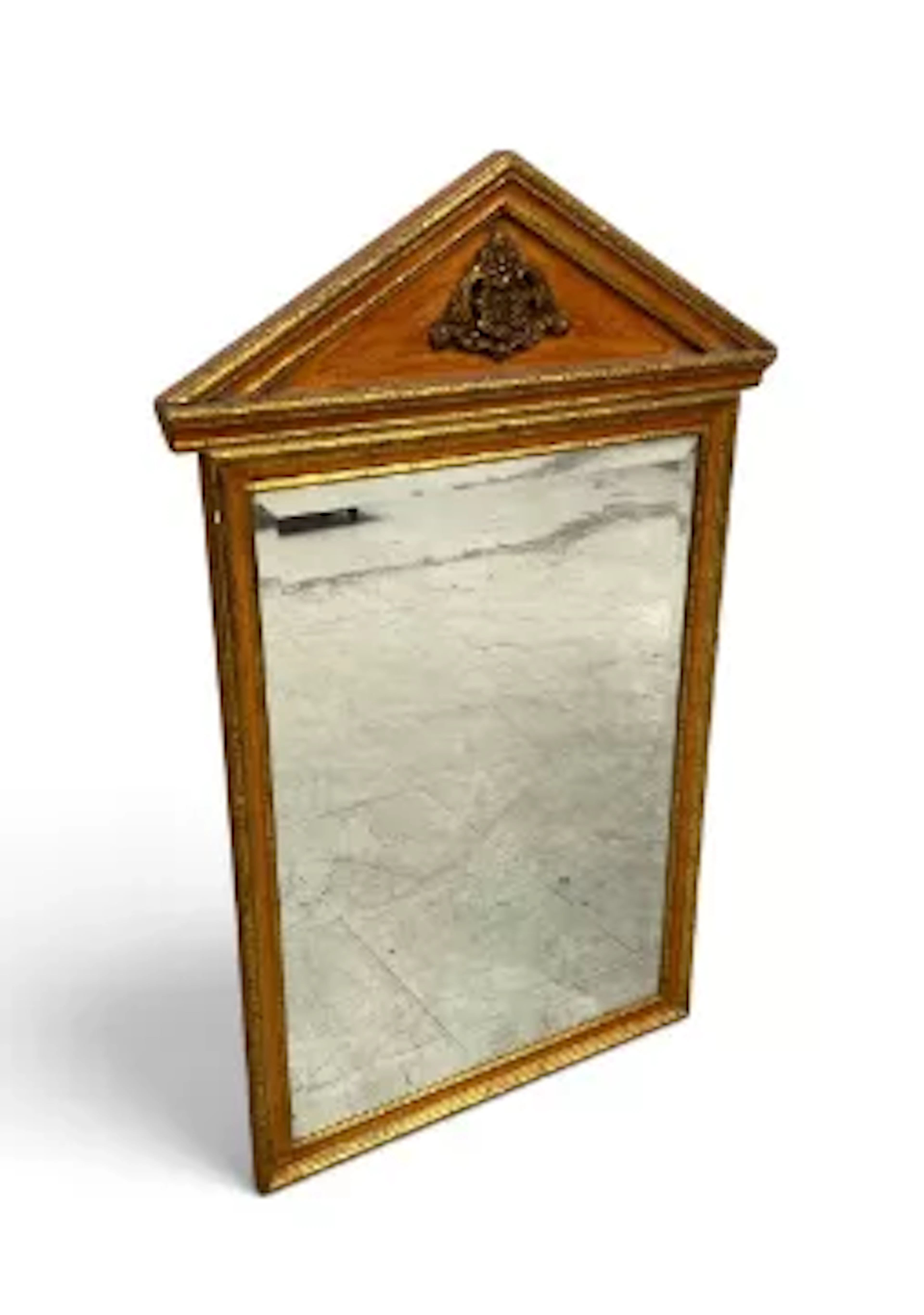 A neoclassical style bevelled wall mirror with architectural pediment