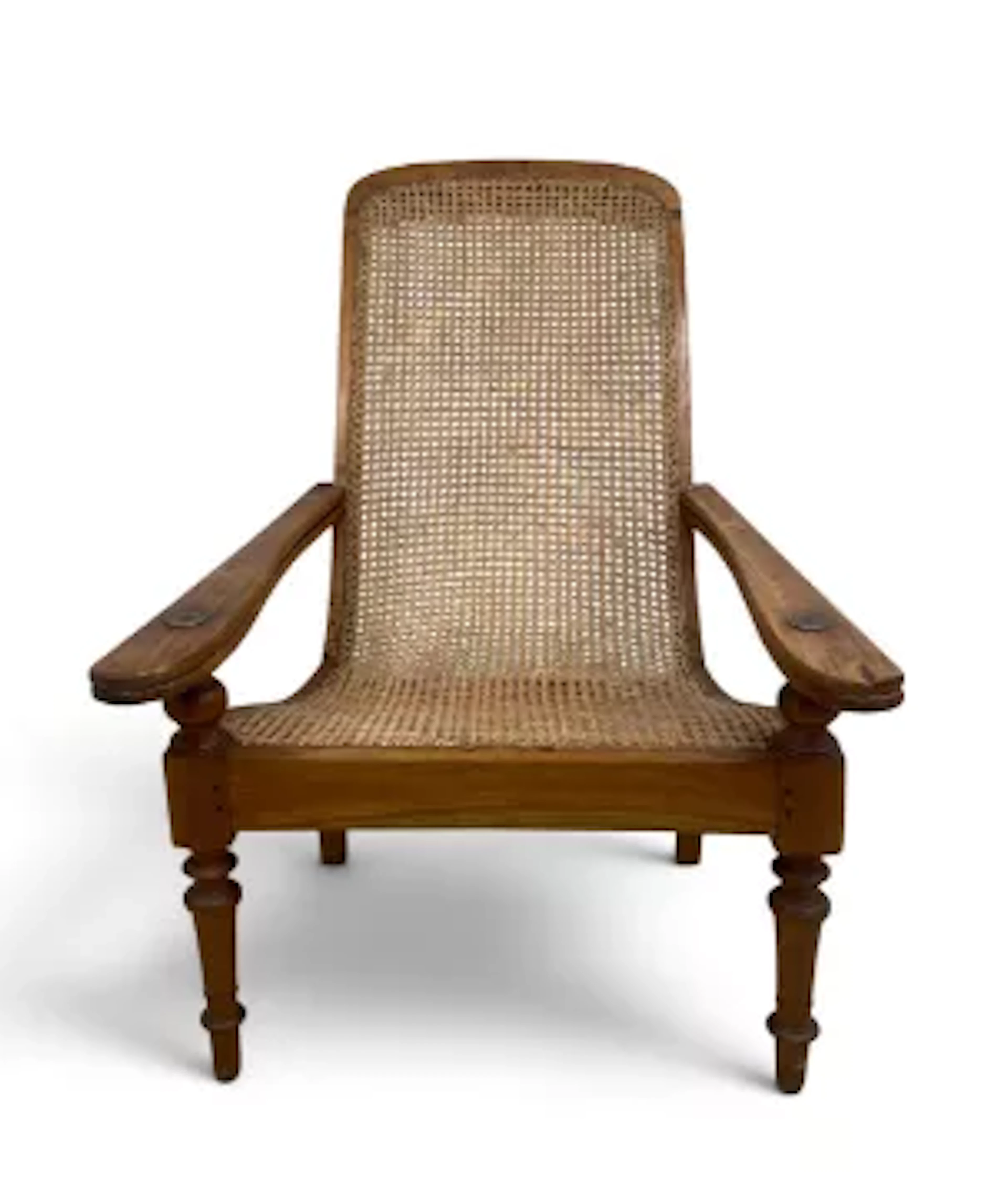 A 19th century teak planters reclining armchair with caned seat and