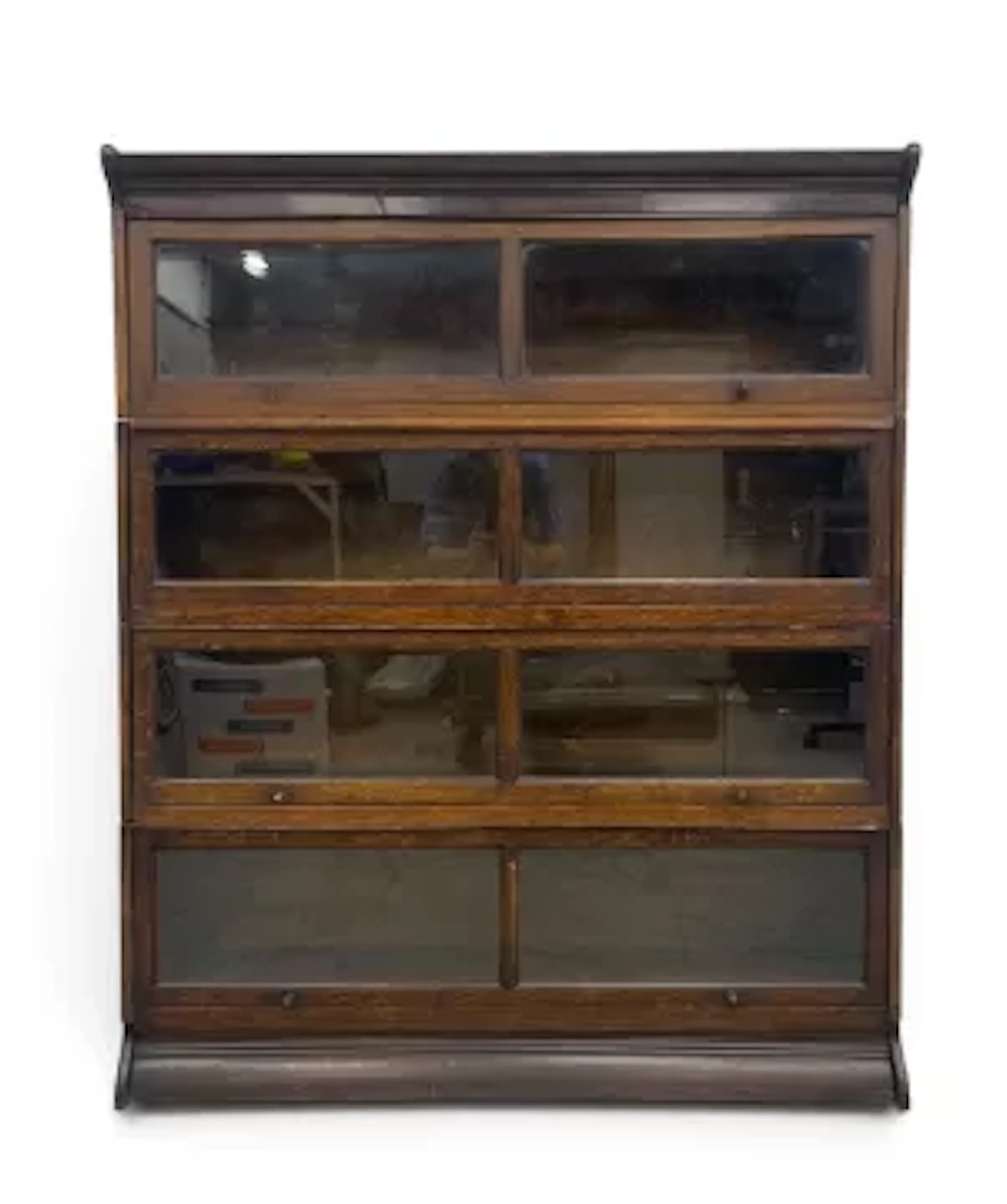An early 20th century oak Globe Wernicke type four section bookcase