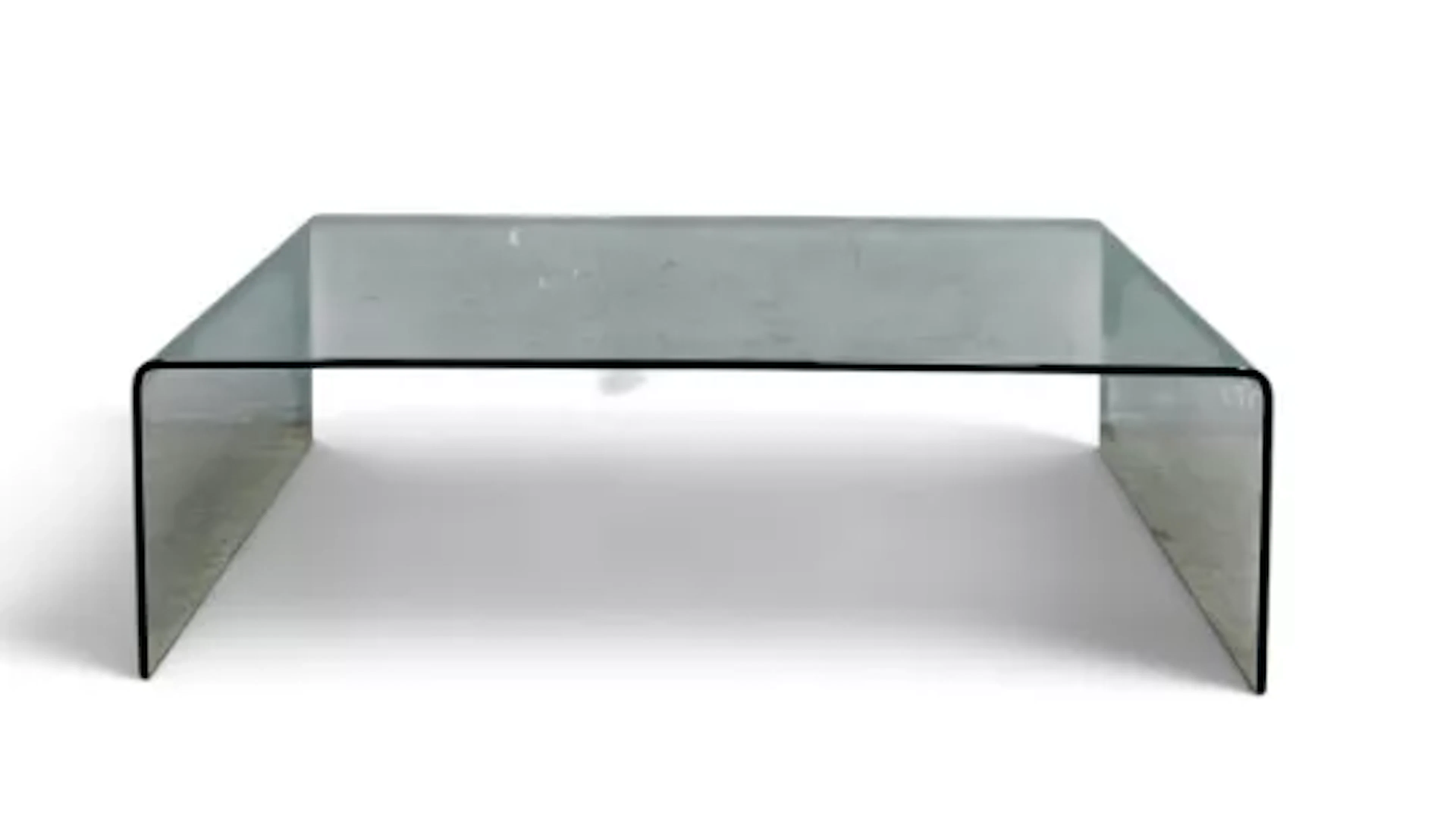 A contemporary bent plate glass coffee table. H.32 x W.108 x D.60cm.