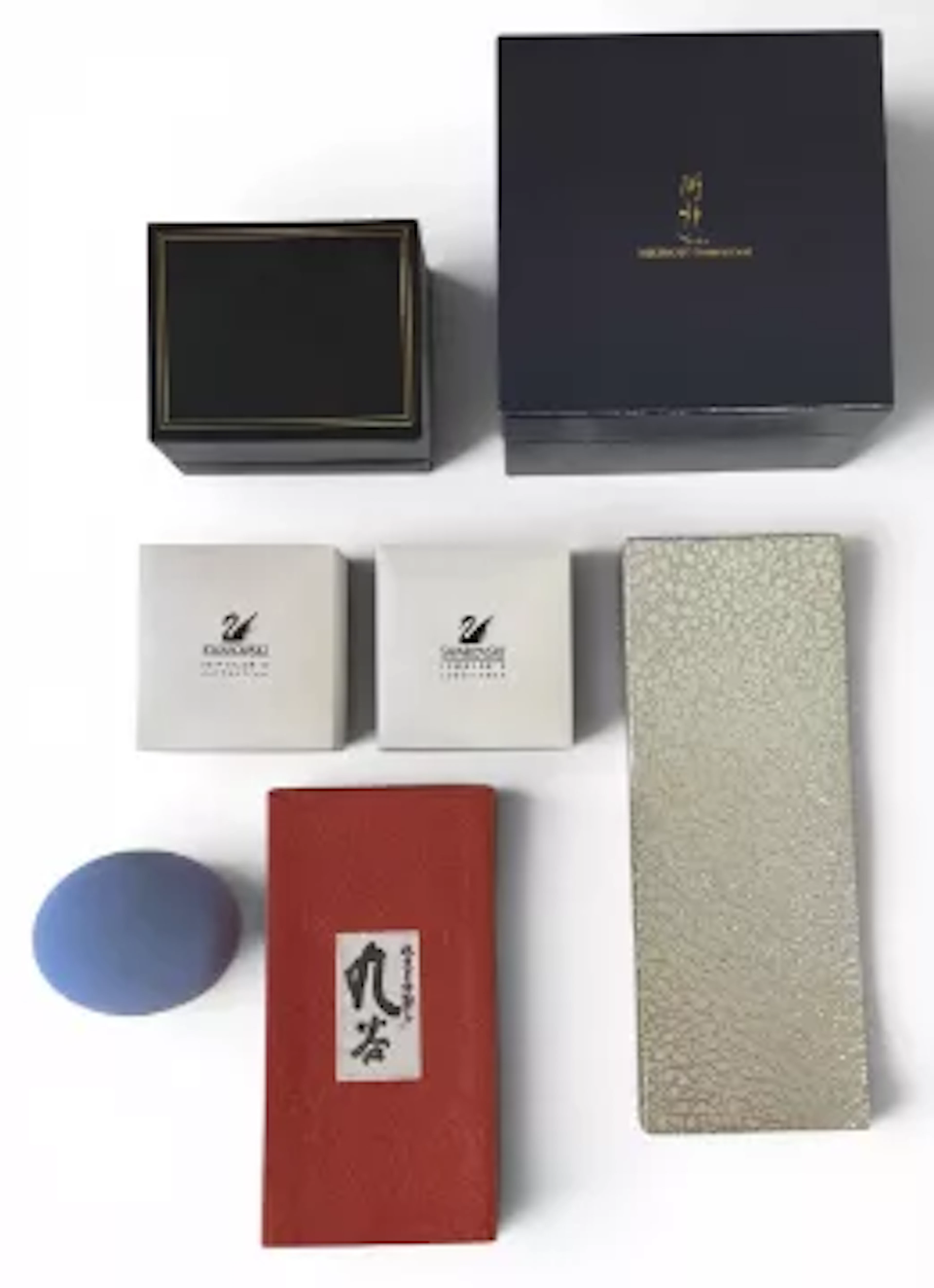 A mixed lot to include a Swarovski leaf brooch and clip-on earrings