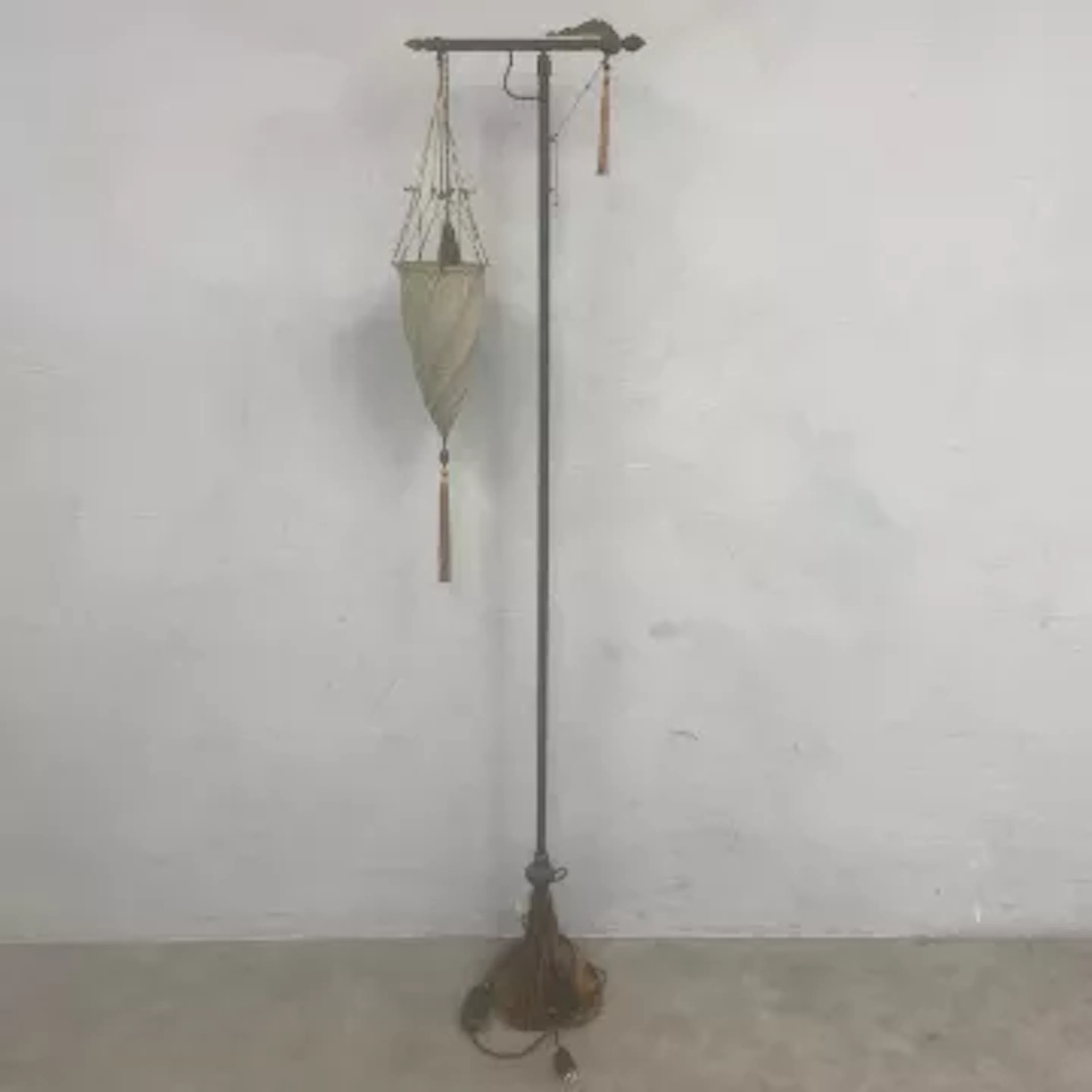 A contemporary Italian 'Cesendello' floor lamp with fabric wound armature