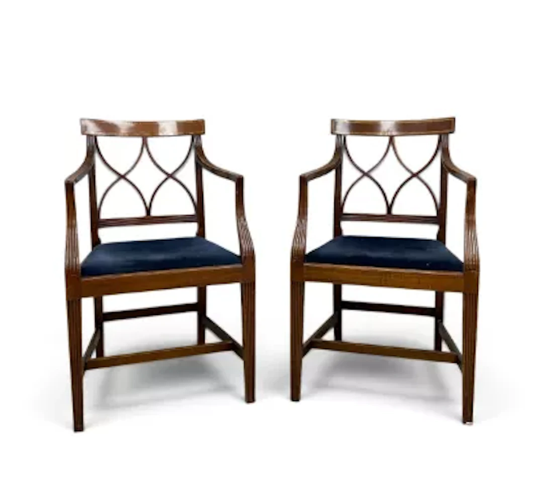 A pair of late 19th century Georgian style elbow chairs, openwork