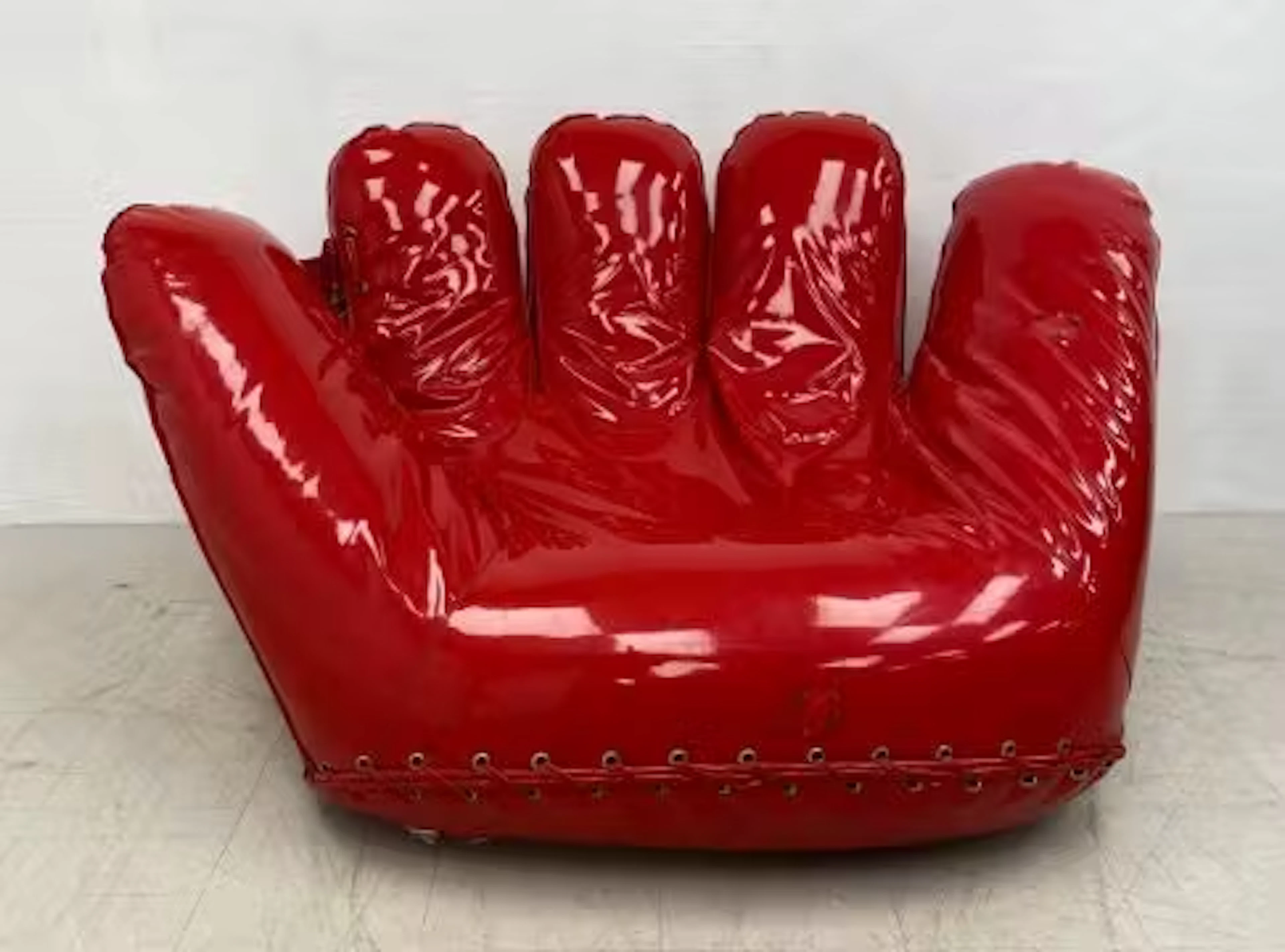A vintage red latex upholstered 'Joe' baseball mitt lounge chair by