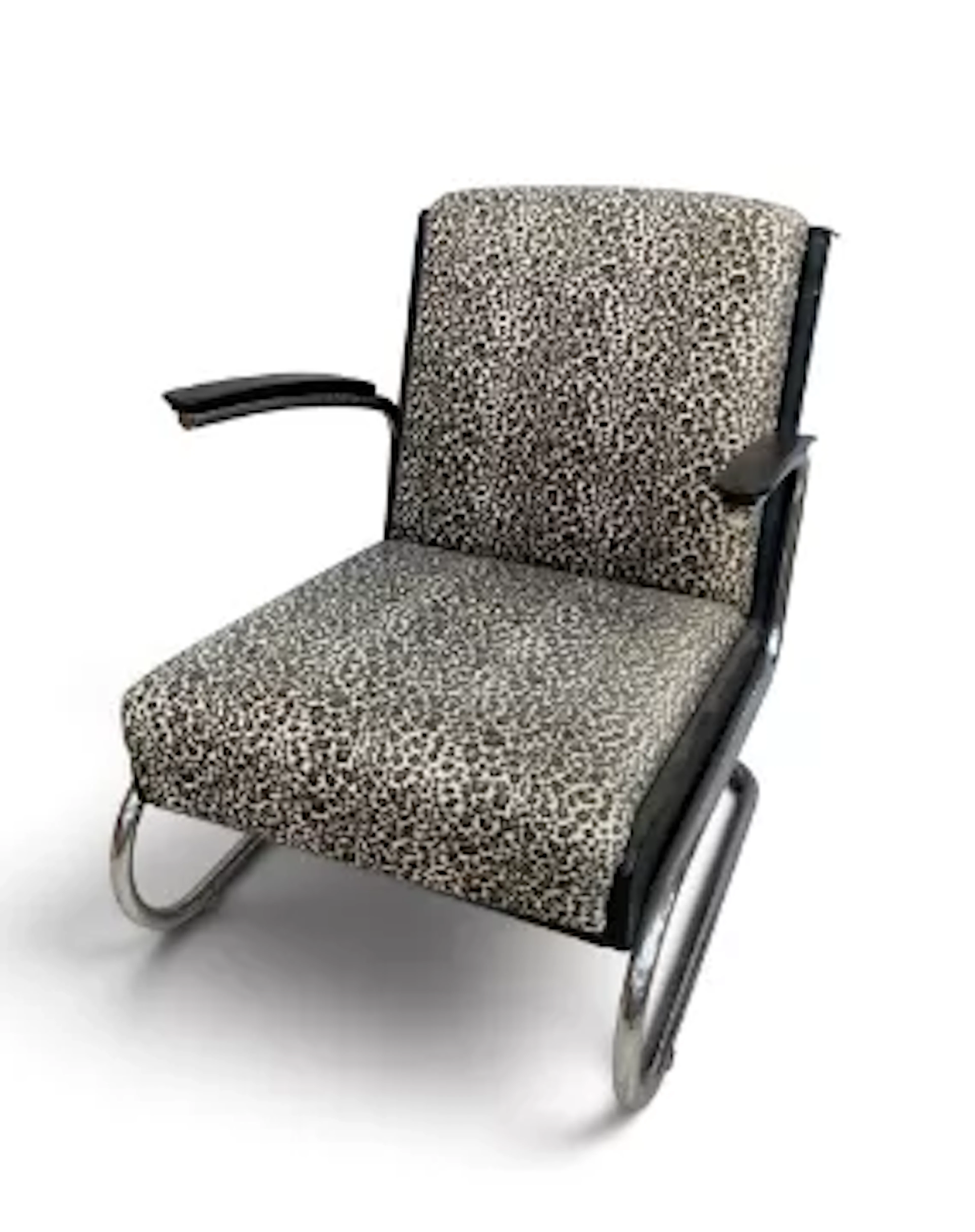 A vintage Bauhaus inspired Mucke Melder lounge chair in animal print