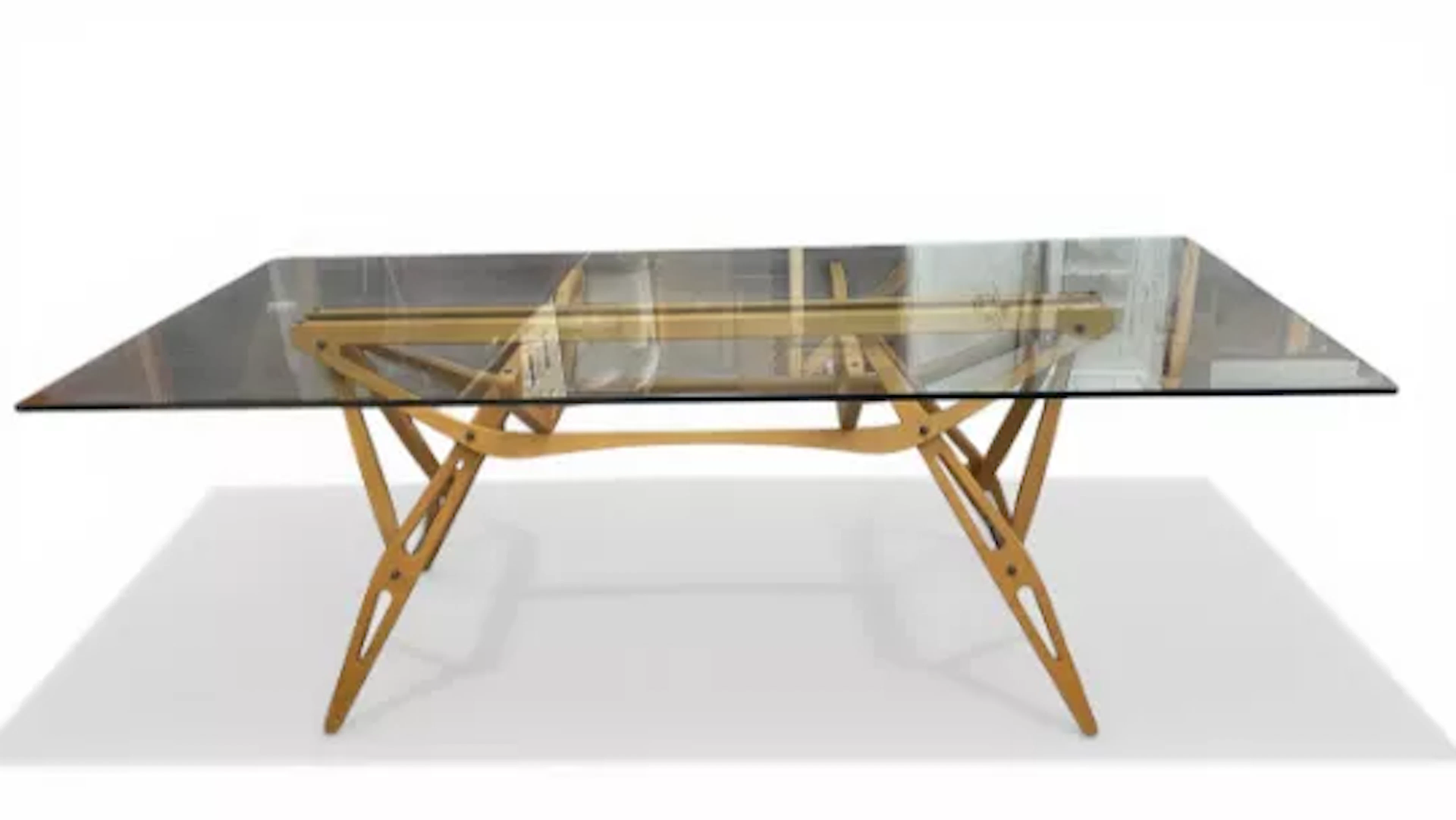 A contemporary Italian Reale dining table with rectangular plate glass