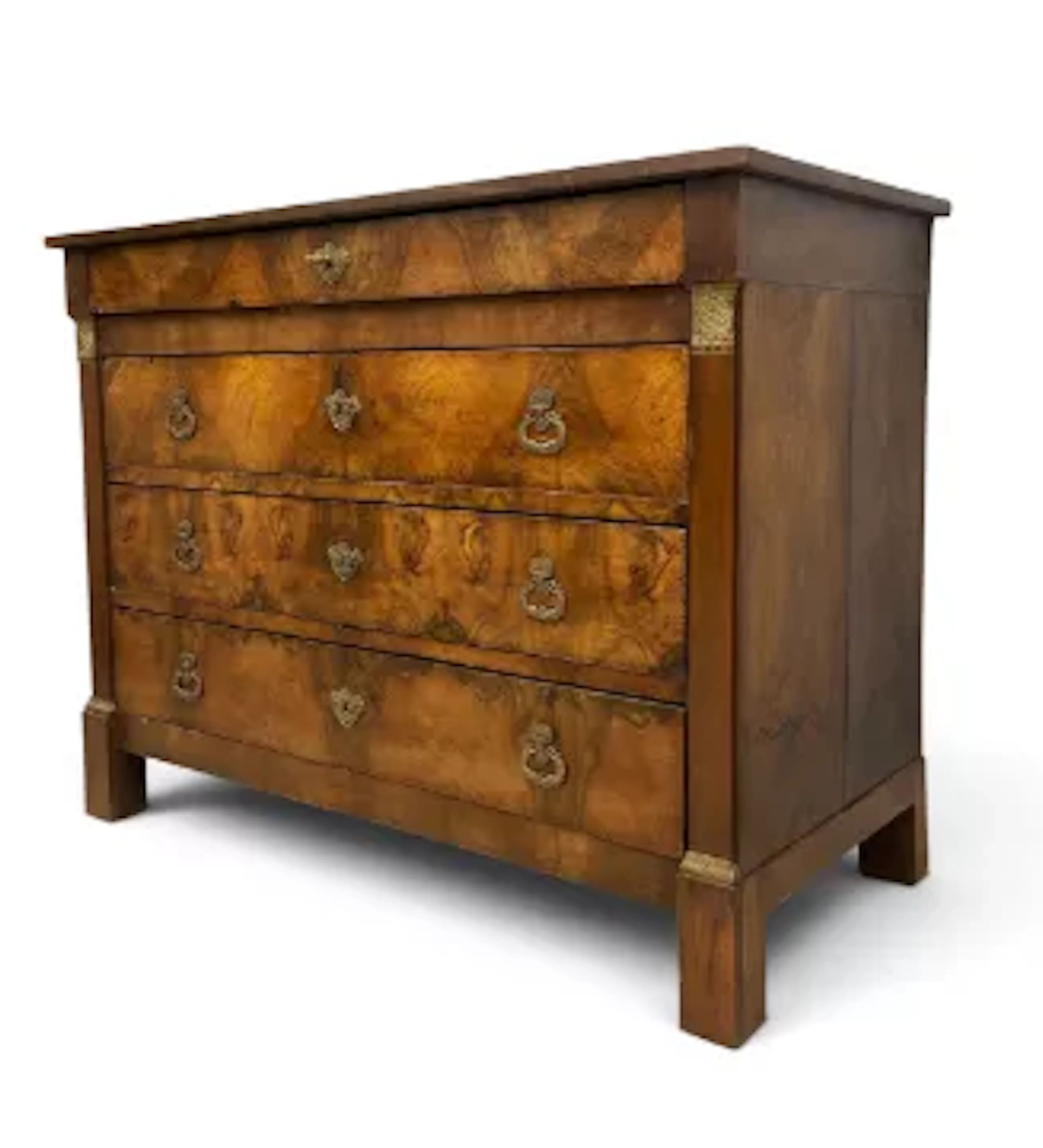 A 19th century Louis Philippe burr walnut commode with secret frieze