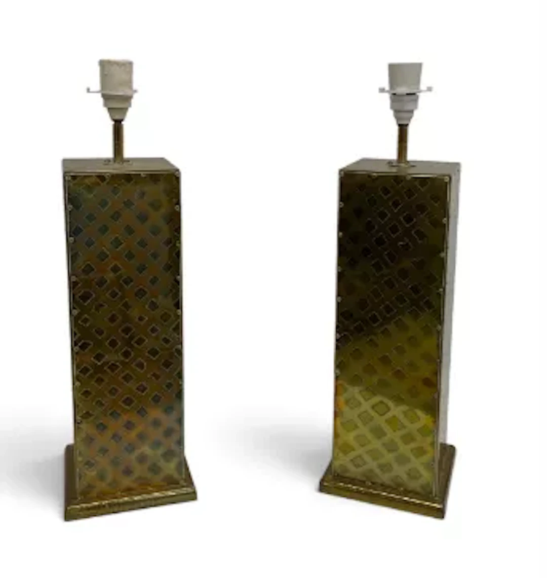A pair of mid century Brutalist style engraved brass table lamps