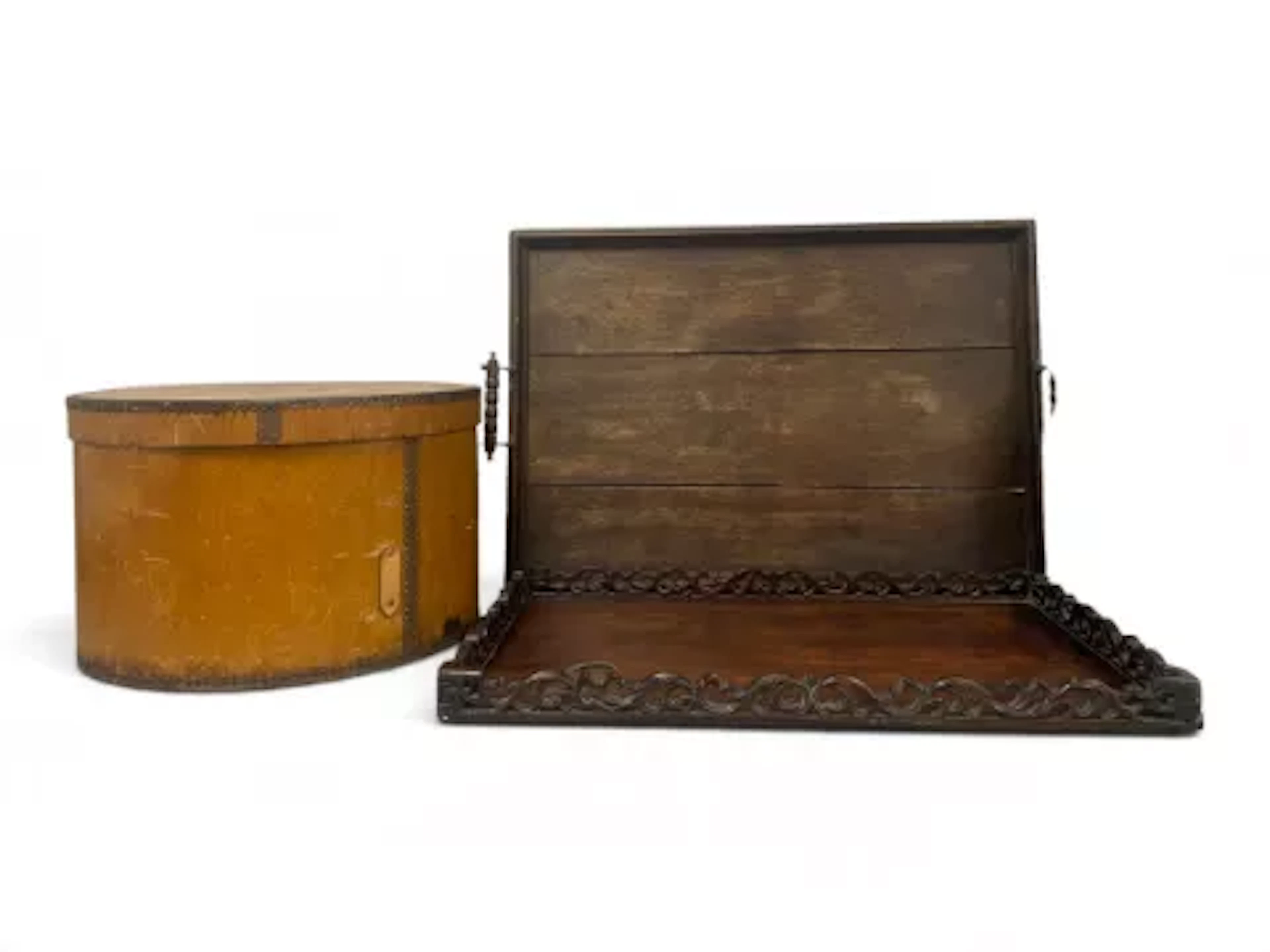 A pair of early 20th century nesting hat boxes in bentwood with patterned