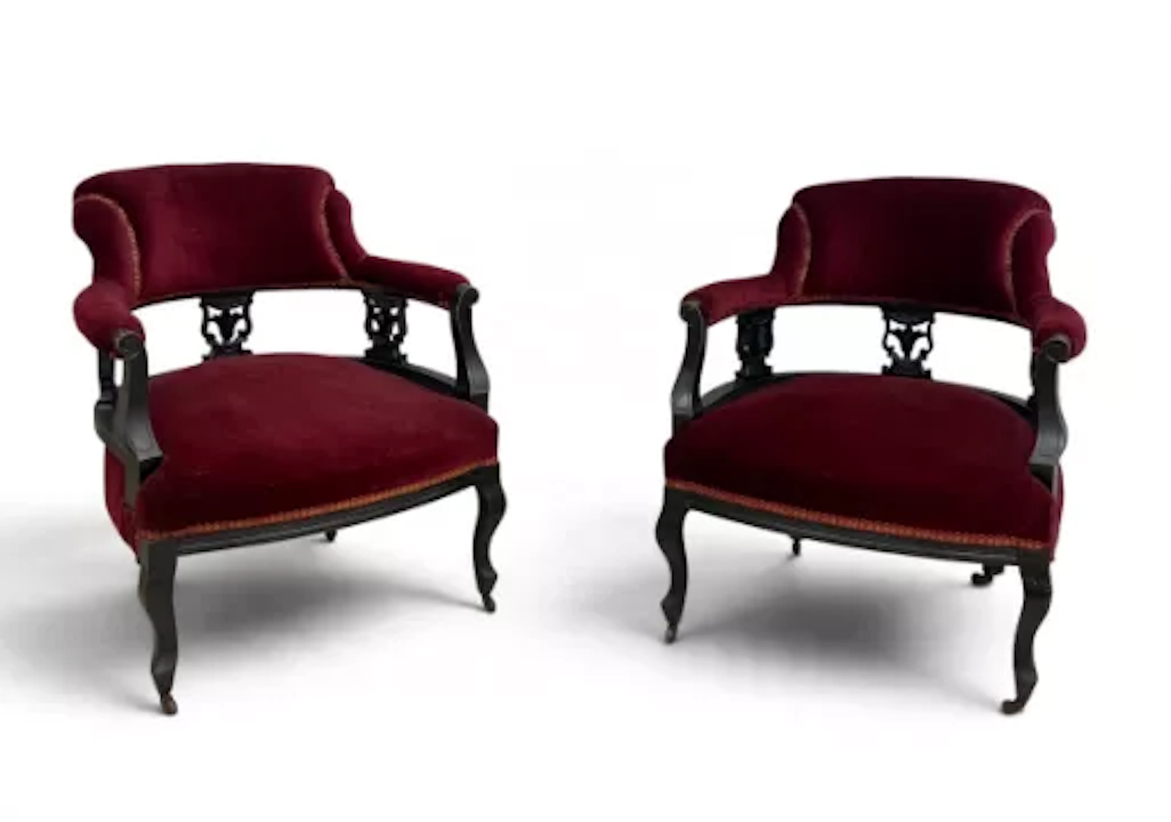 A pair of late 19th century ebonised tub armchairs. H.73 x W.63 x D.48cm