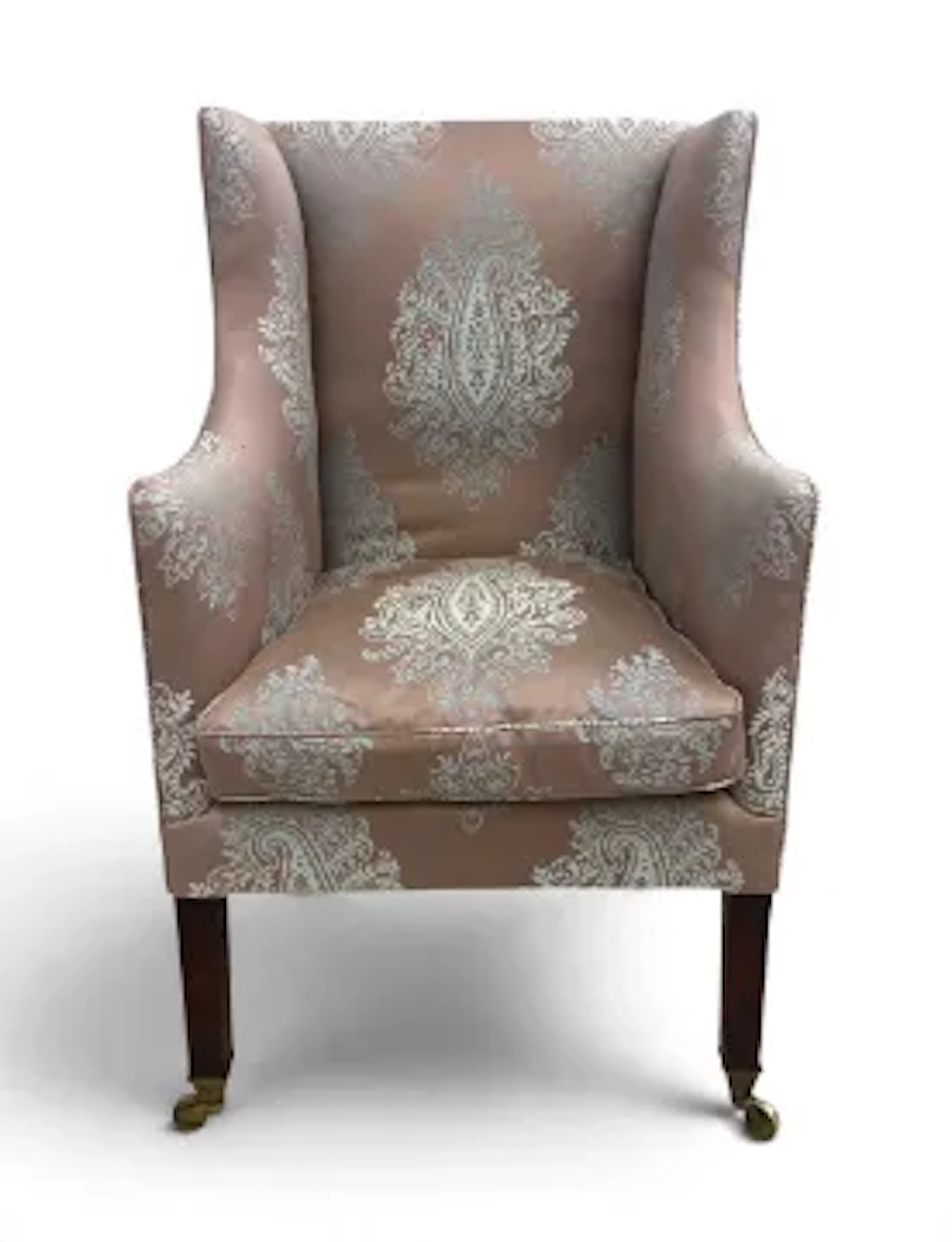 A Georgian mahogany library tub armchair in foliate damask upholstery