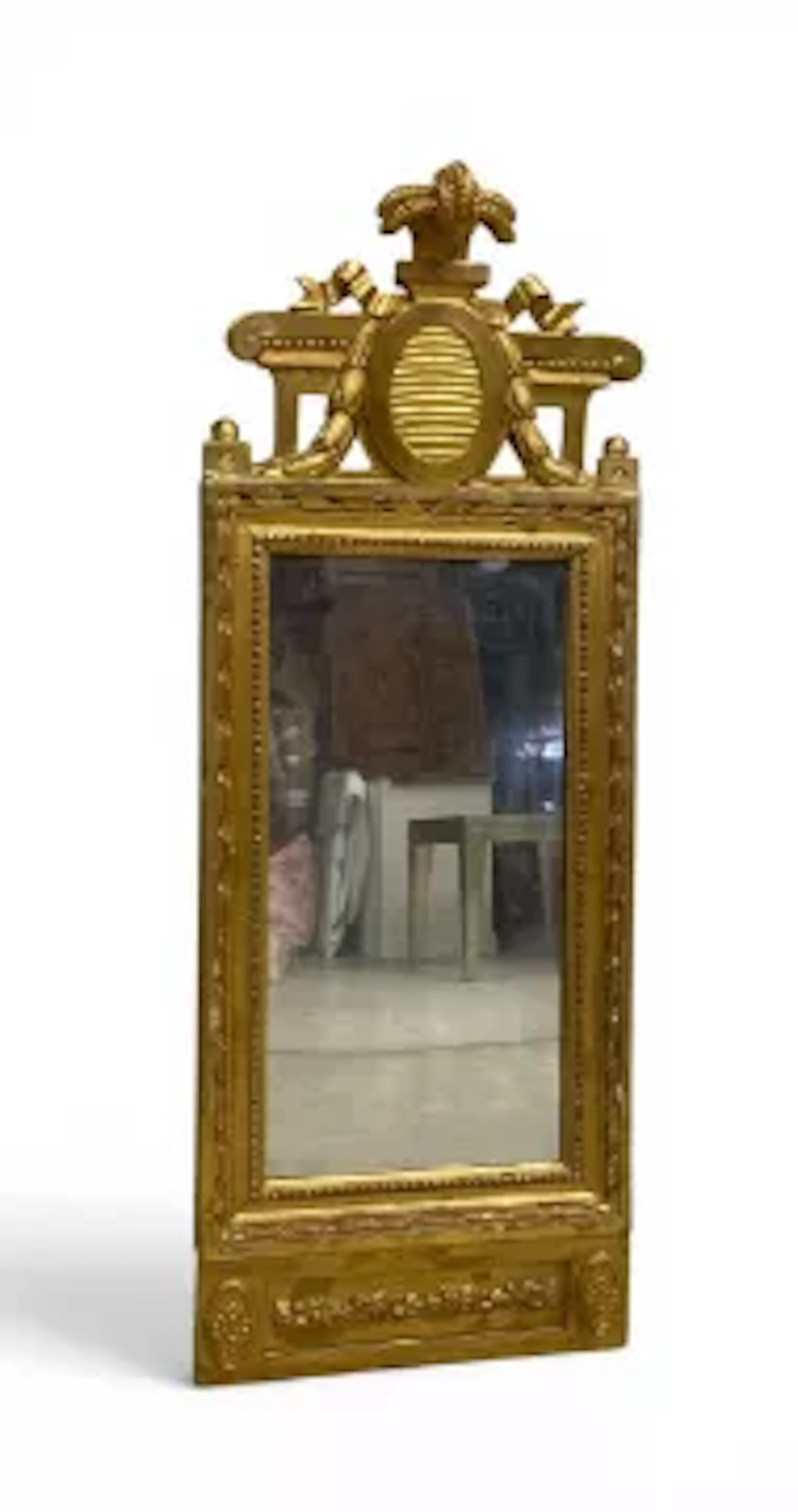 A 19th century Swedish Gustavian style pier mirror having a carved
