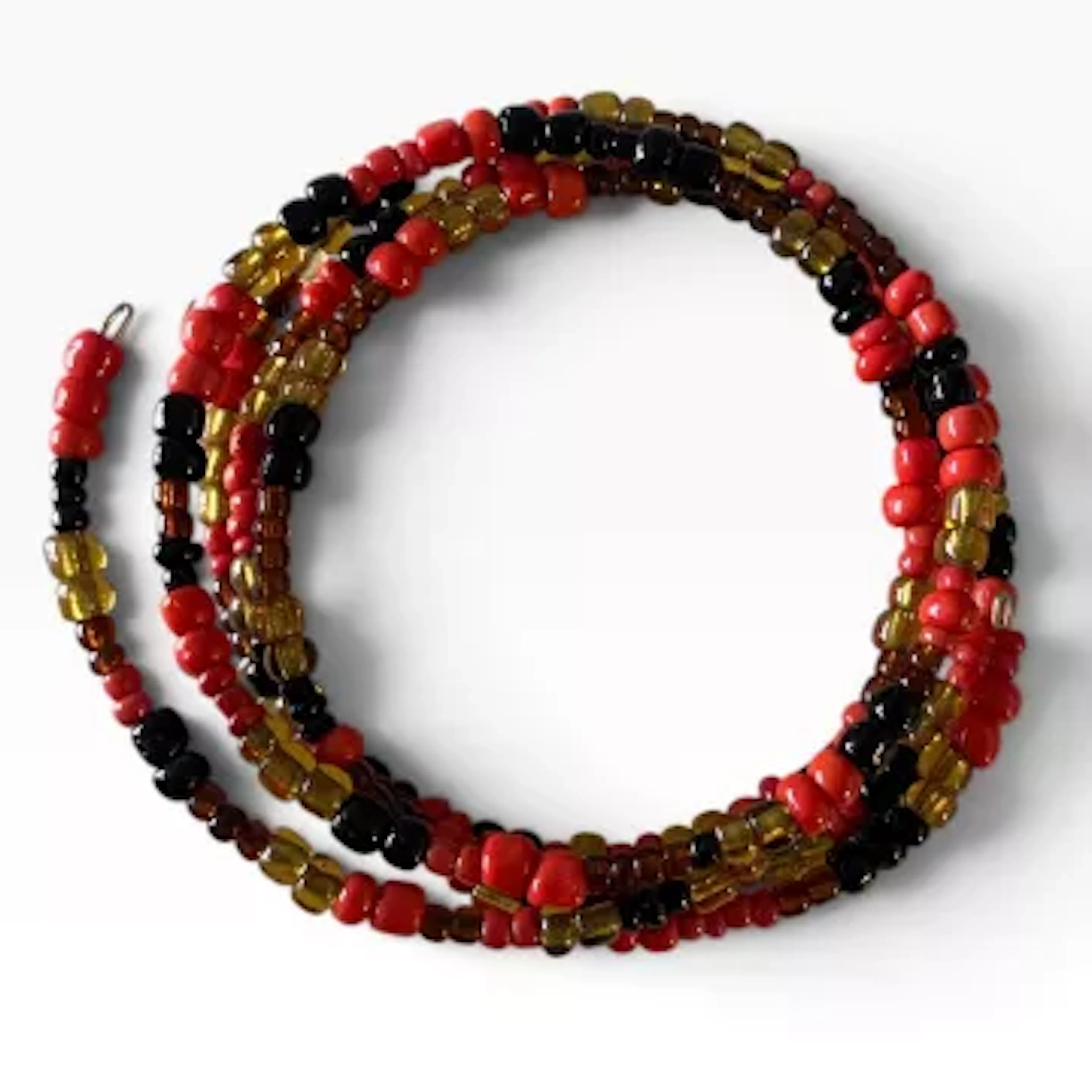 A collection of jewellery to include: a contemporary beaded bracelet