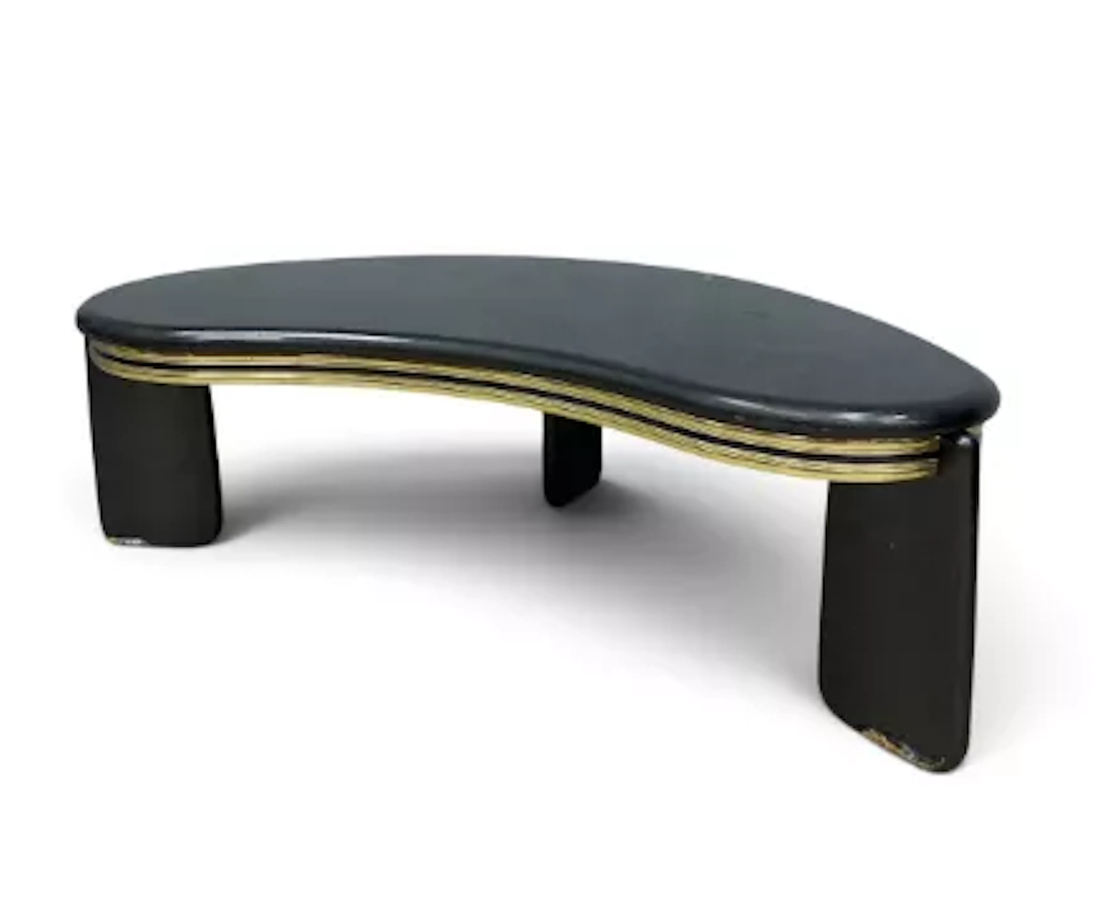 A 1980s vintage shaped top coffee table in a black lacquer finish