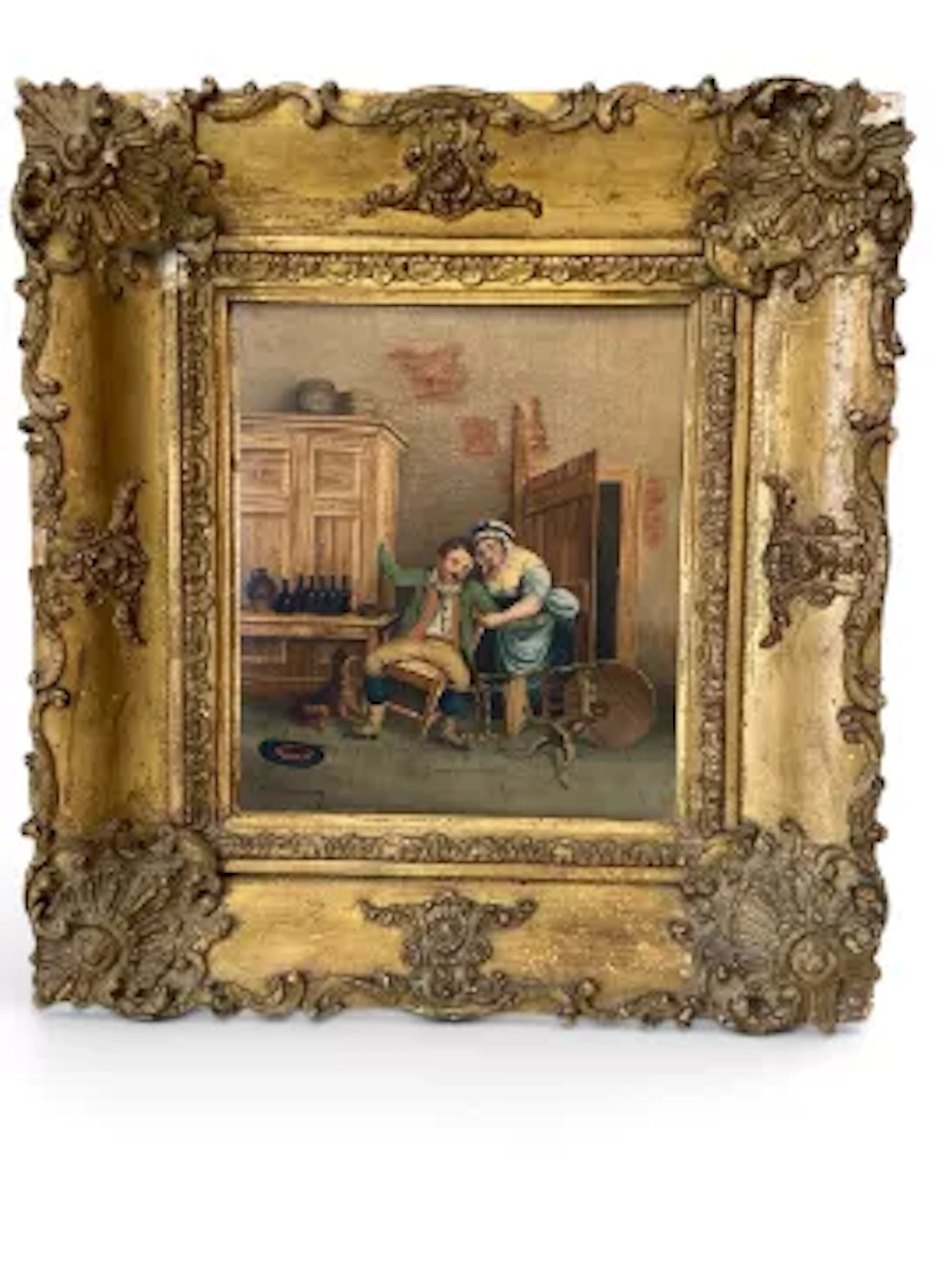 An 18th century gilt framed oil on canvas, Dutch tavern scene with